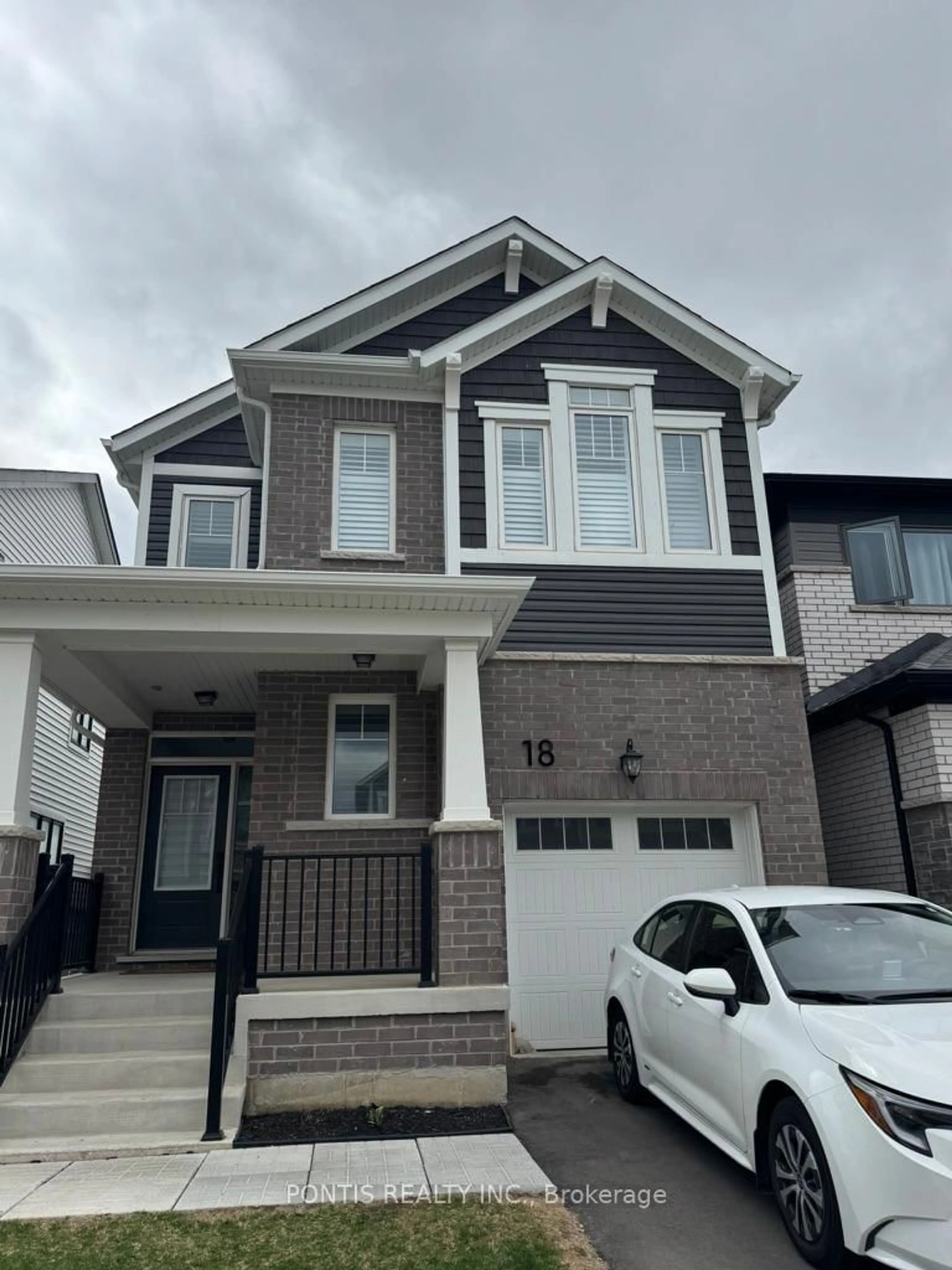 Home with brick exterior material, street for 18 SAXONY St, Kitchener Ontario N2R 0S3