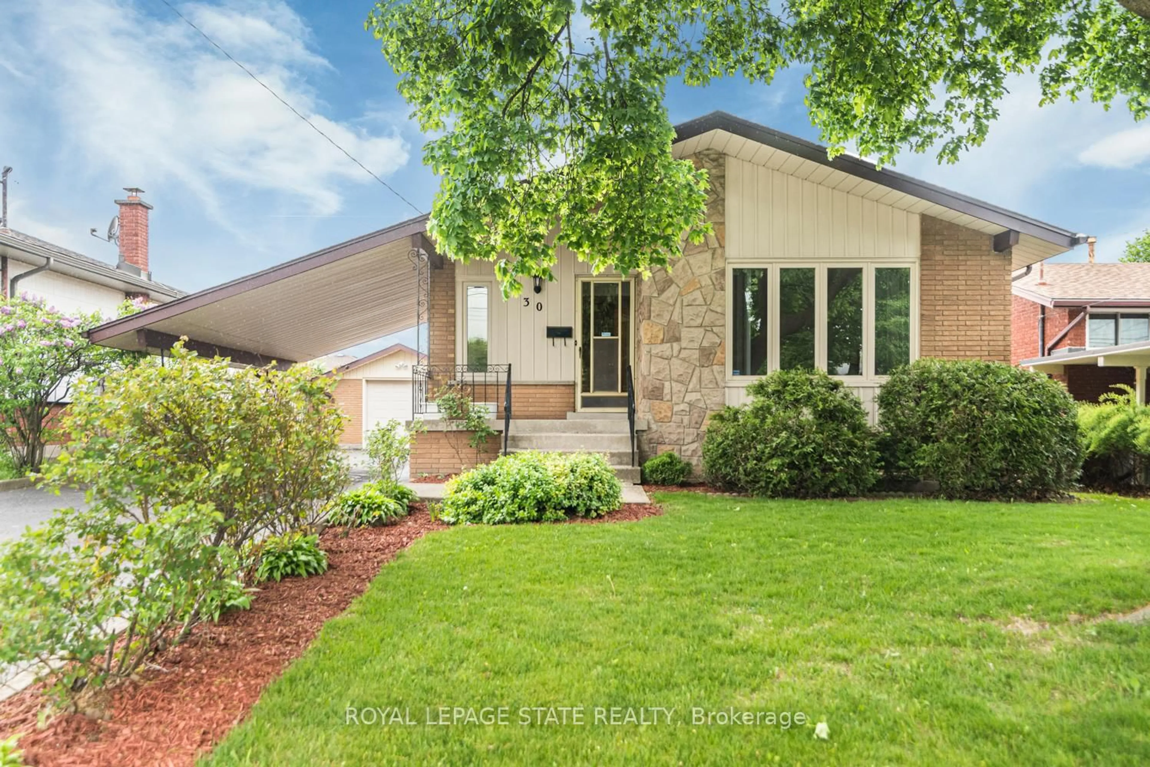 Home with brick exterior material, street for 30 Greeningdon Dr, Hamilton Ontario L9A 3A7