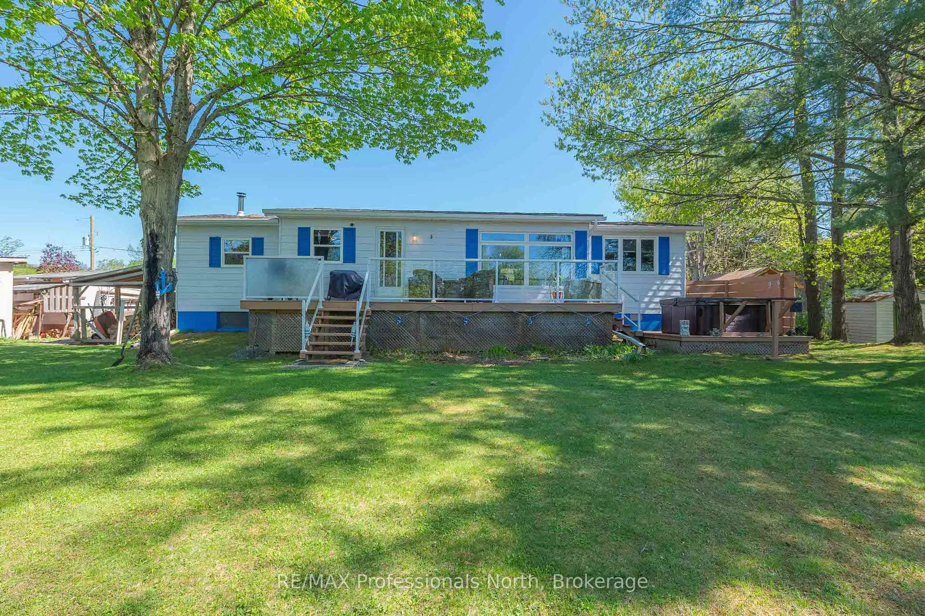 A pic from outside/outdoor area/front of a property/back of a property/a pic from drone, water/lake/river/ocean view for 1027 Current Tr, Minden Hills Ontario K0M 2K0