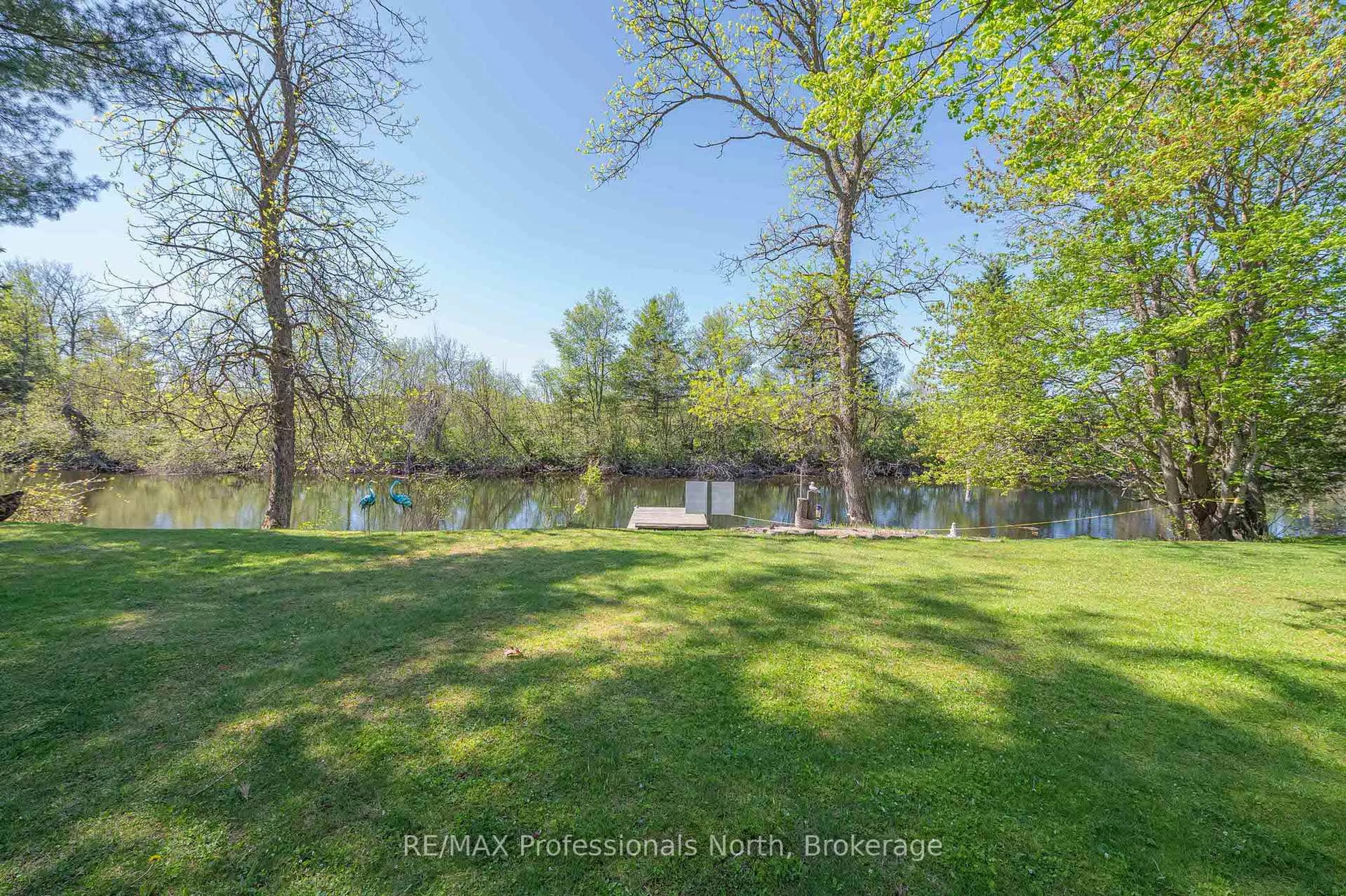 A pic from outside/outdoor area/front of a property/back of a property/a pic from drone, water/lake/river/ocean view for 1027 Current Tr, Minden Hills Ontario K0M 2K0