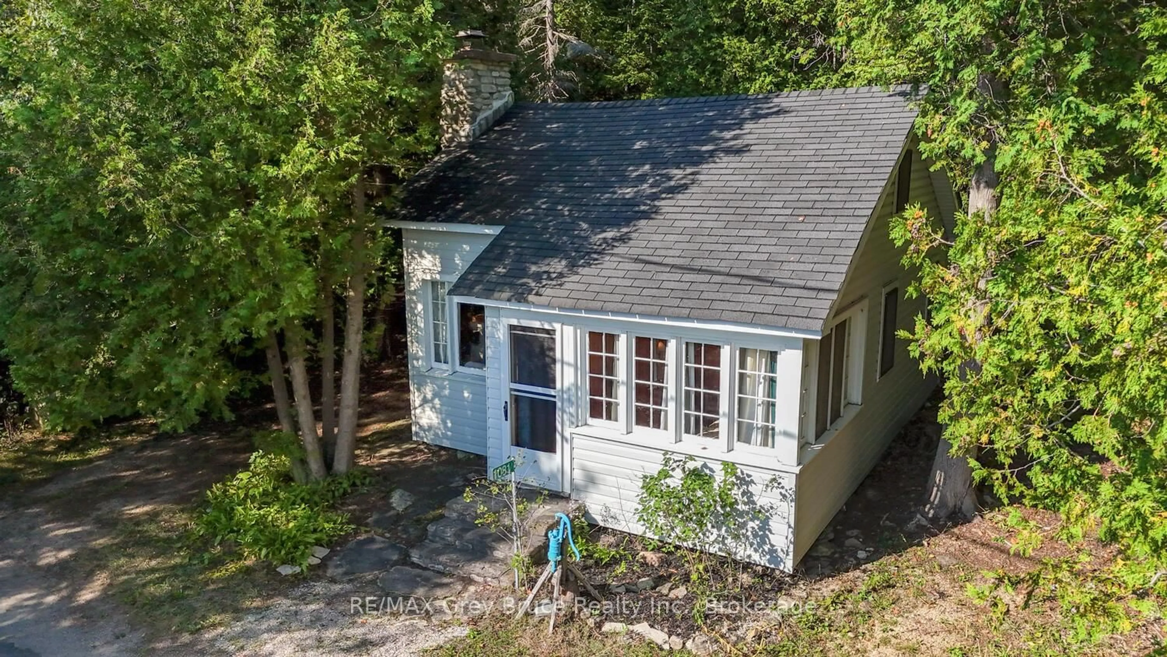 A pic from outside/outdoor area/front of a property/back of a property/a pic from drone, street for 1081 DYERS BAY Rd, Northern Bruce Peninsula Ontario N0H 1Z0