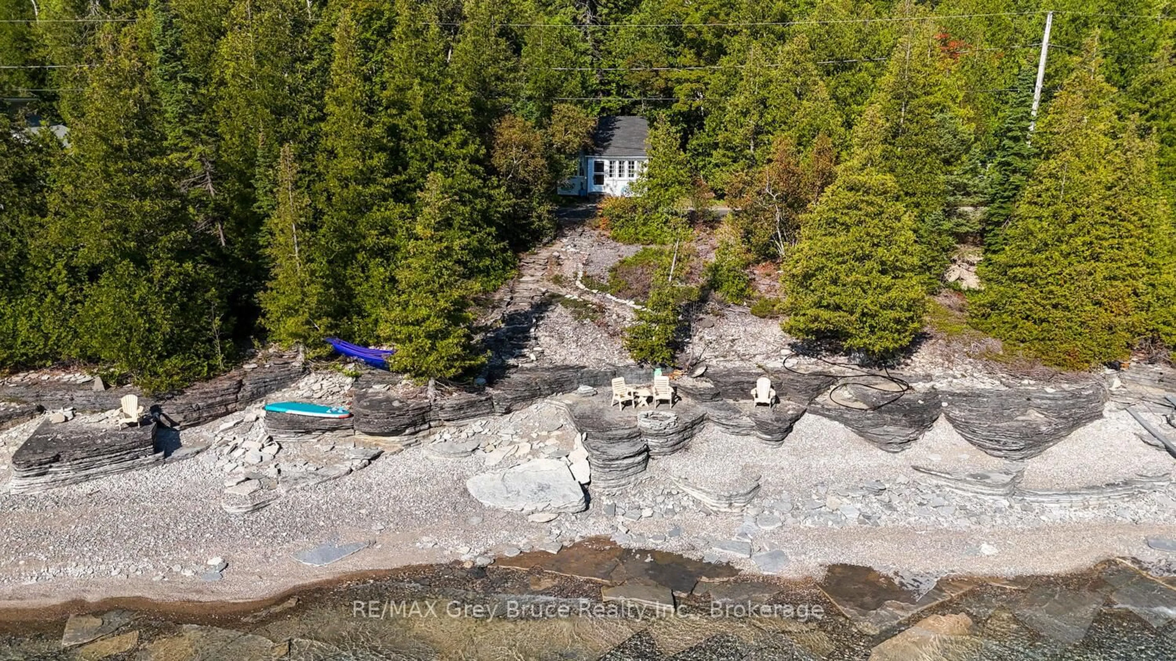 A pic from outside/outdoor area/front of a property/back of a property/a pic from drone, water/lake/river/ocean view for 1081 DYERS BAY Rd, Northern Bruce Peninsula Ontario N0H 1Z0