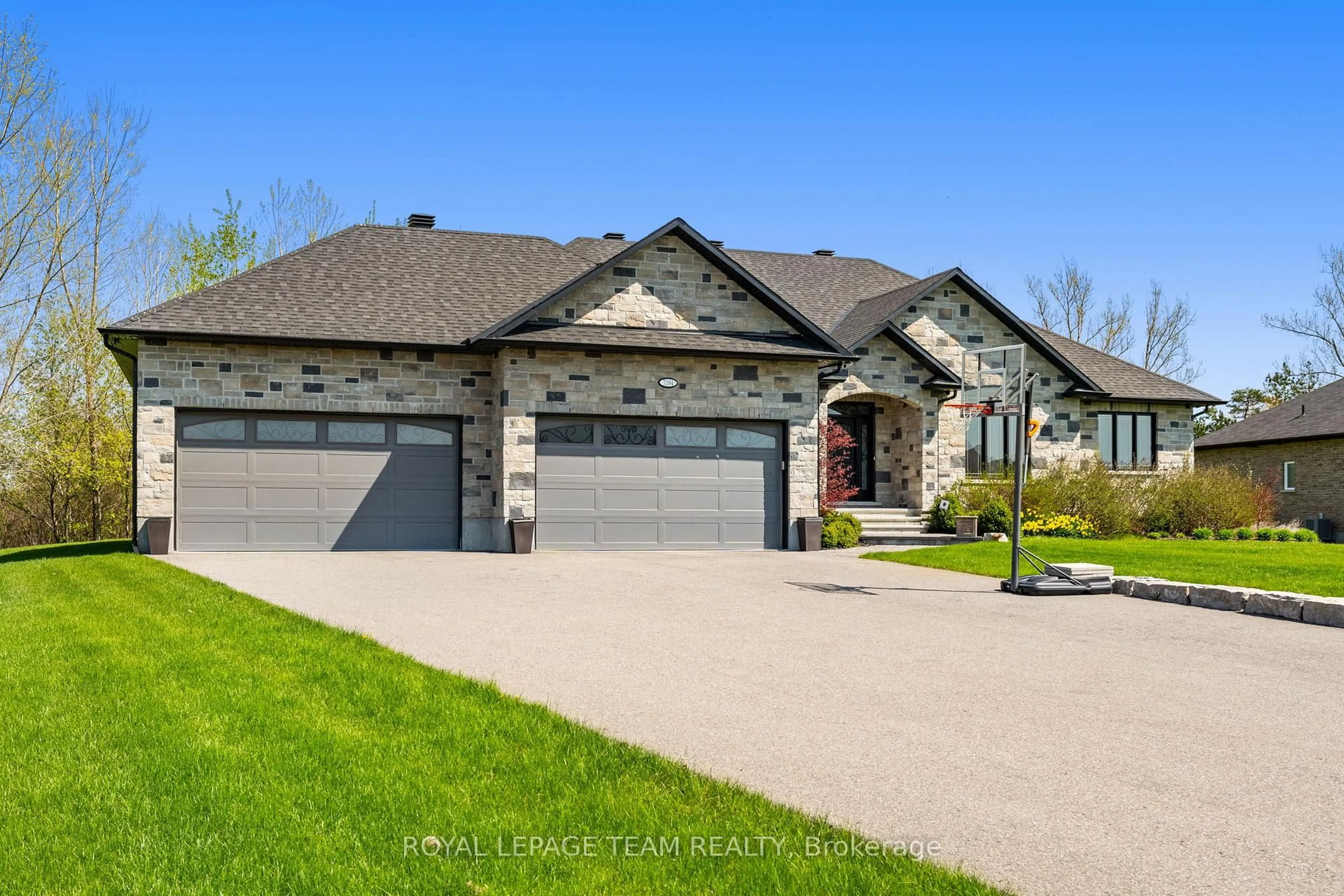 Home with brick exterior material, street for 7384 Blue Water Cres, Greely Ontario K4P 0C6