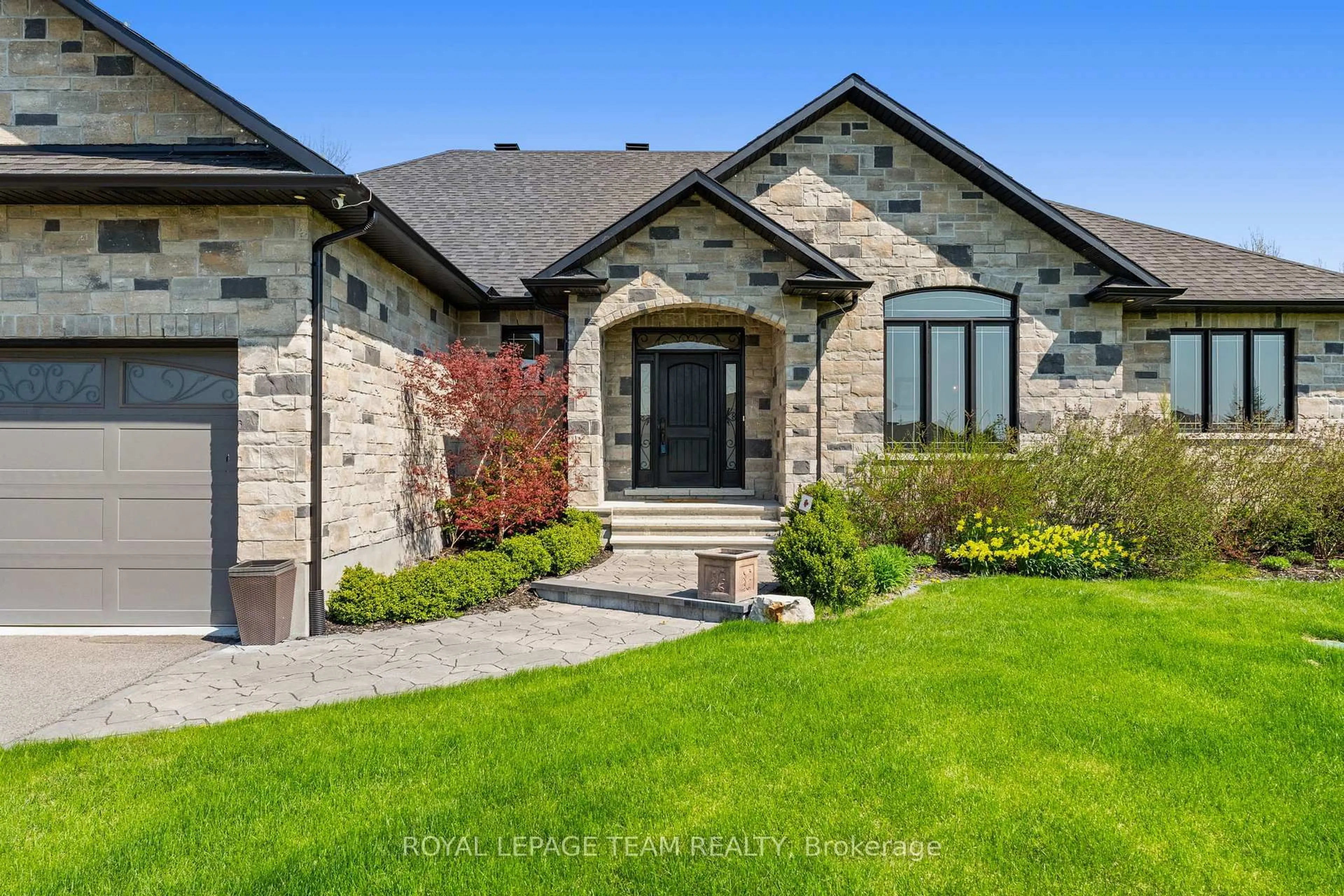 Home with brick exterior material, street for 7384 Blue Water Cres, Greely Ontario K4P 0C6