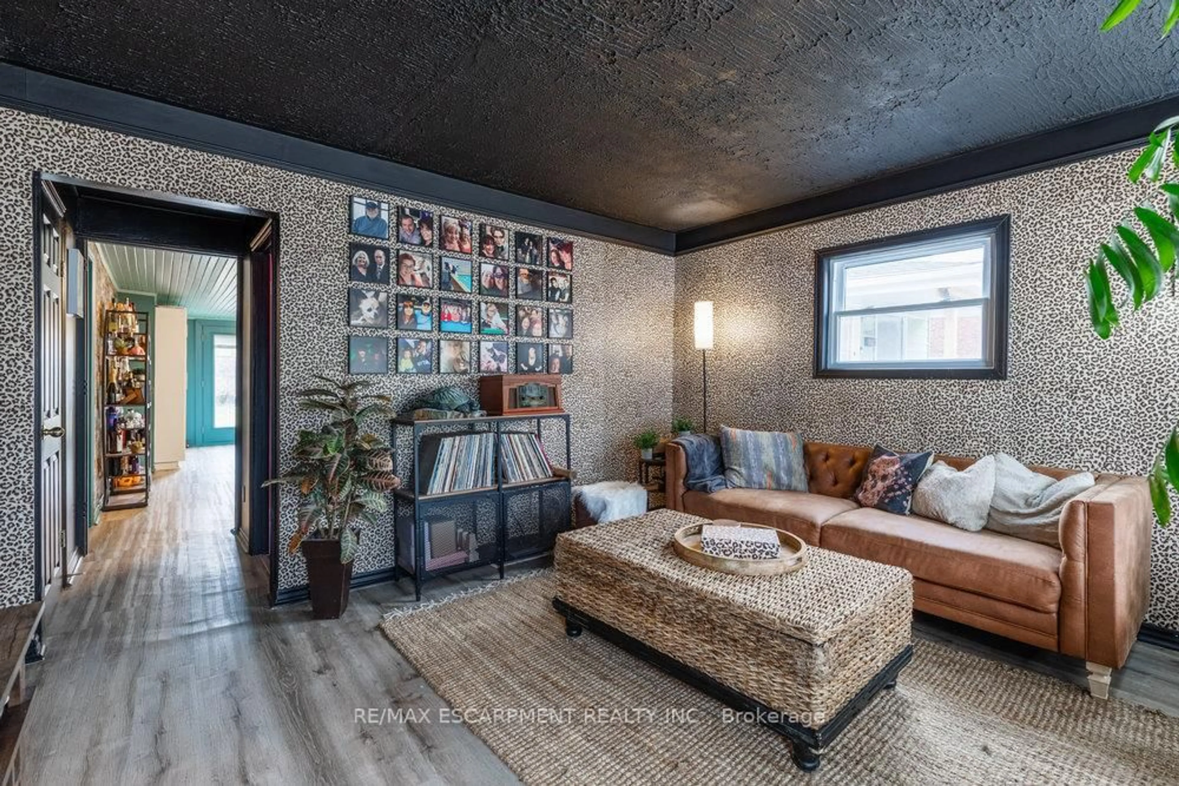 Living room with furniture, cement floor for 4671 Ferguson St, Niagara Falls Ontario L2E 2Z3