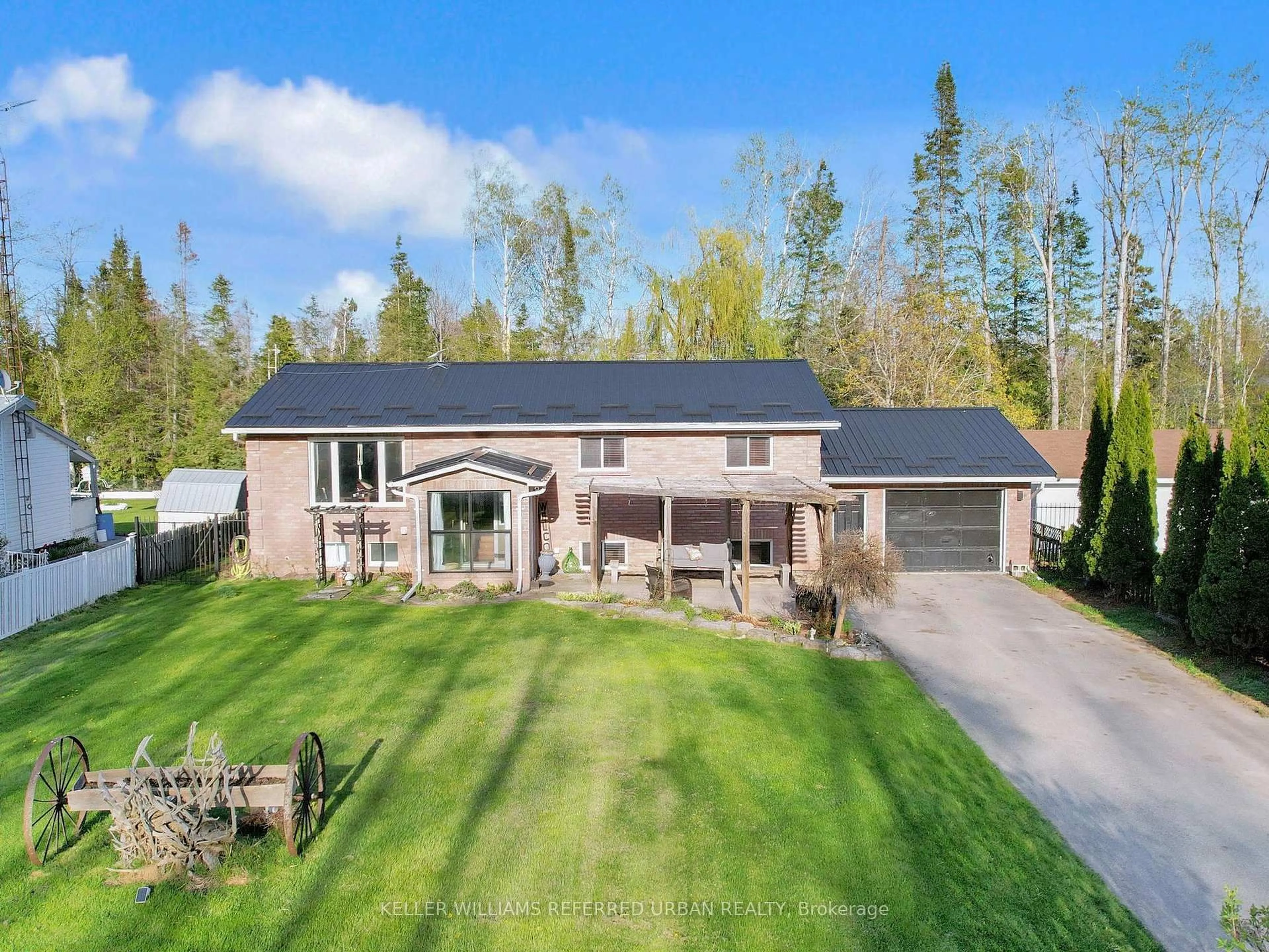 A pic from outside/outdoor area/front of a property/back of a property/a pic from drone, unknown for 30 Trent River Rd, Kawartha Lakes Ontario K0M 2T0