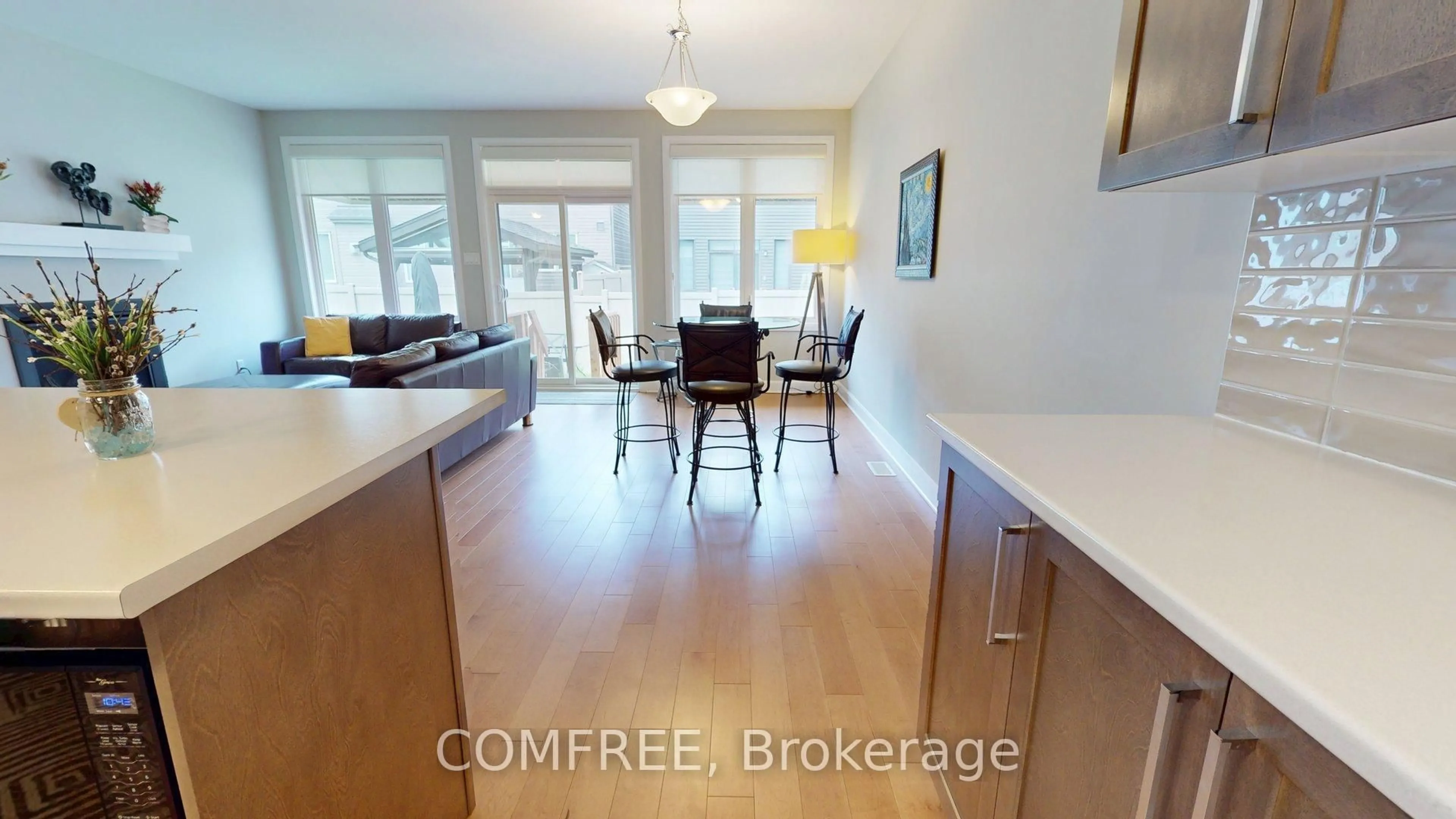 Open concept kitchen, wood/laminate floor for 26 Stickleback Way, Ottawa Ontario K4A 1K9