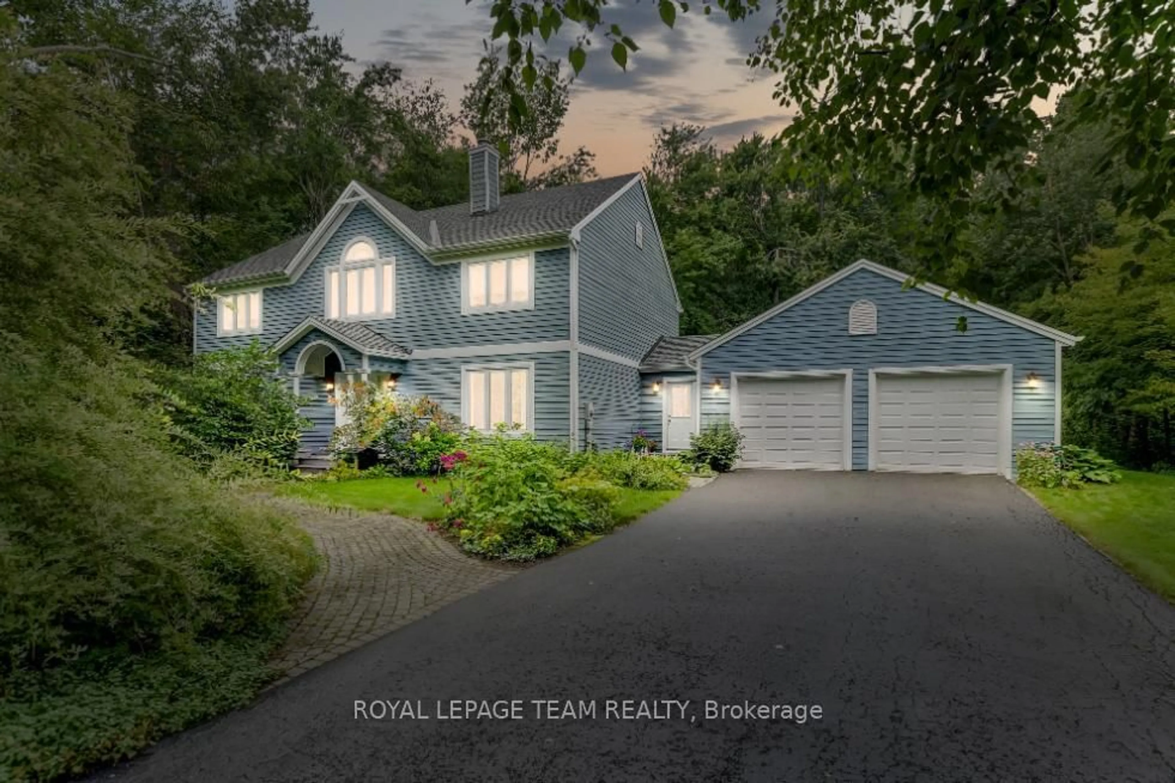 A pic from outside/outdoor area/front of a property/back of a property/a pic from drone, water/lake/river/ocean view for 5517 Cedar Dr, Ottawa Ontario K4M 1B4