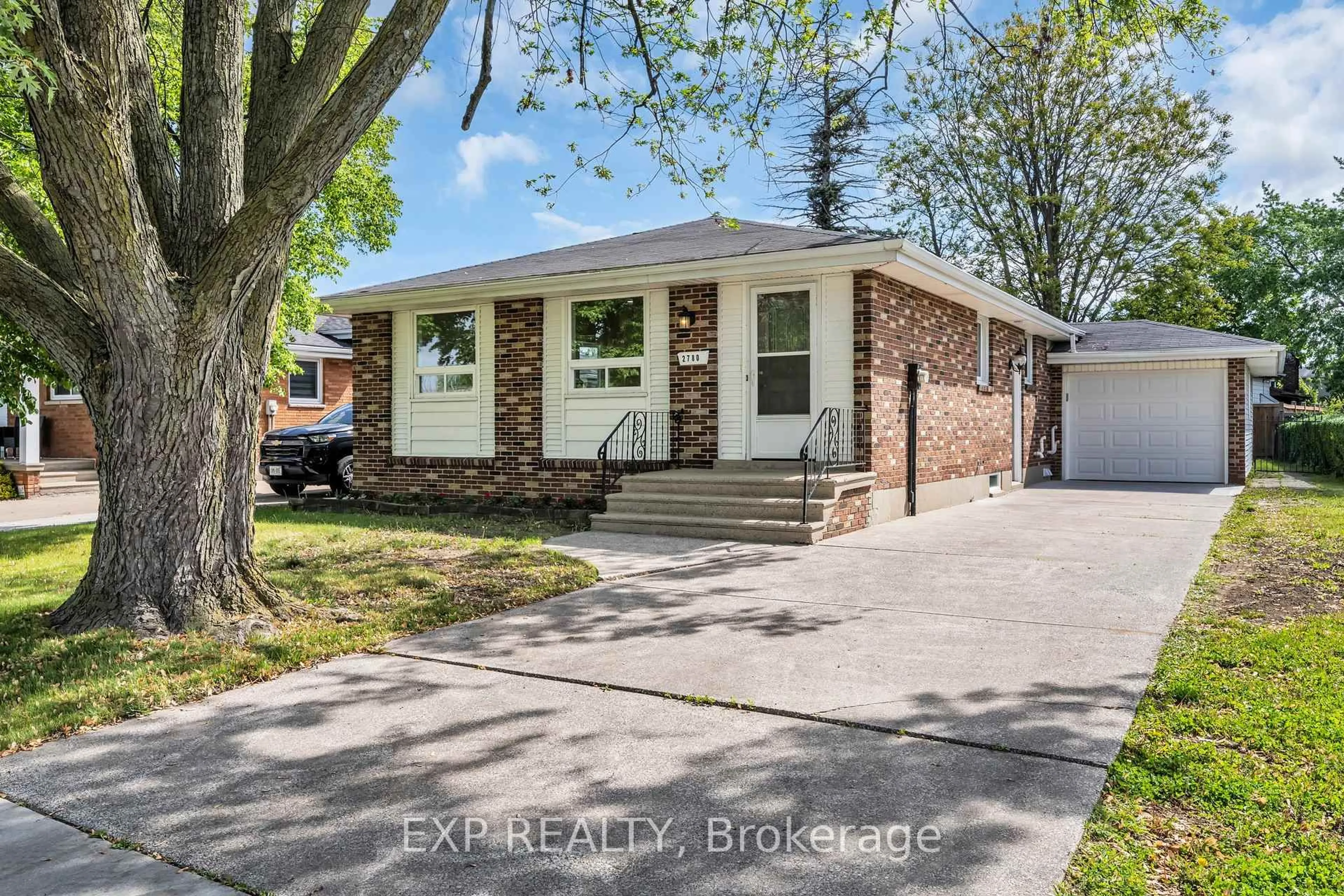 Home with brick exterior material, street for 2780 Forest Glade Dr, Windsor Ontario N8R 1L1