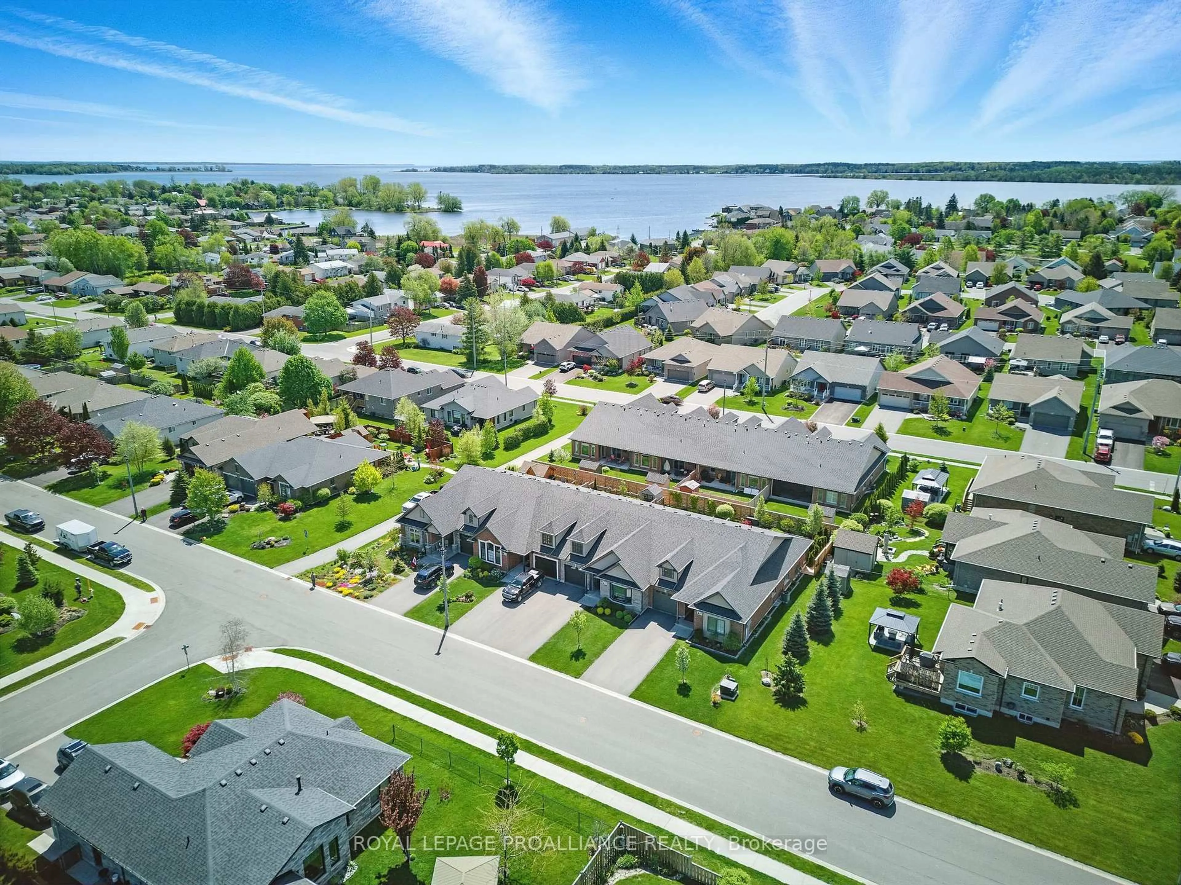 A pic from outside/outdoor area/front of a property/back of a property/a pic from drone, water/lake/river/ocean view for 27 Cove Cres, Brighton Ontario K0K 1H0