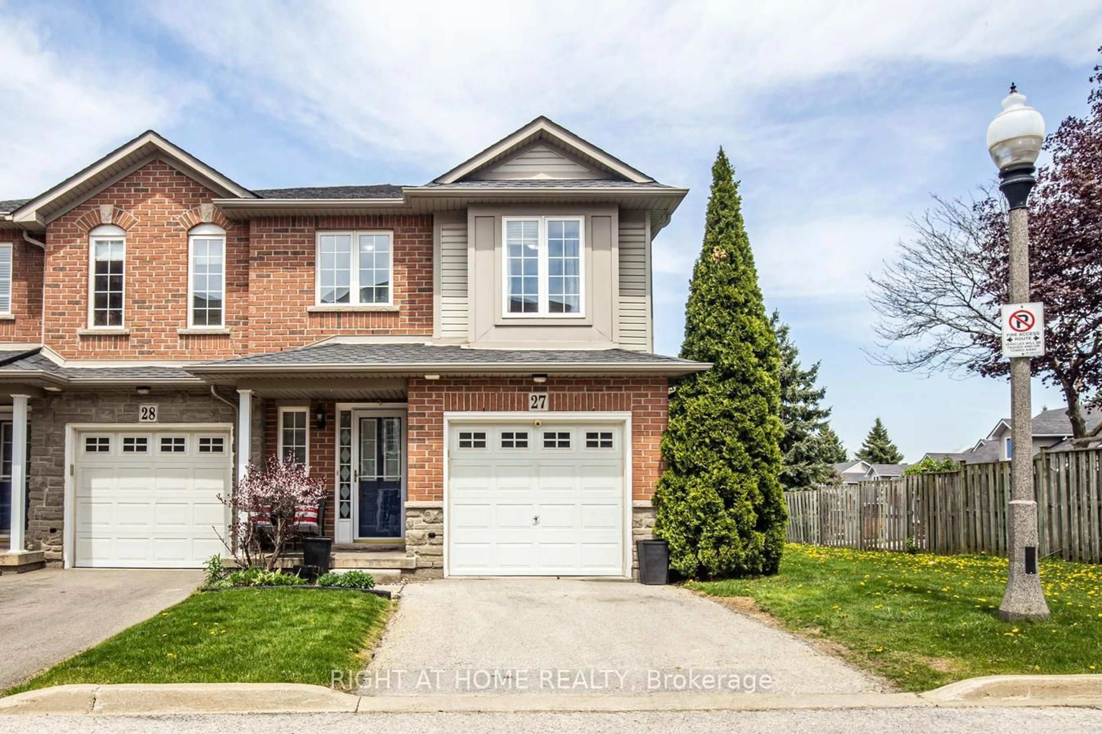 Home with brick exterior material, street for 7 Southside Pl #27, Hamilton Ontario L9C 7W6