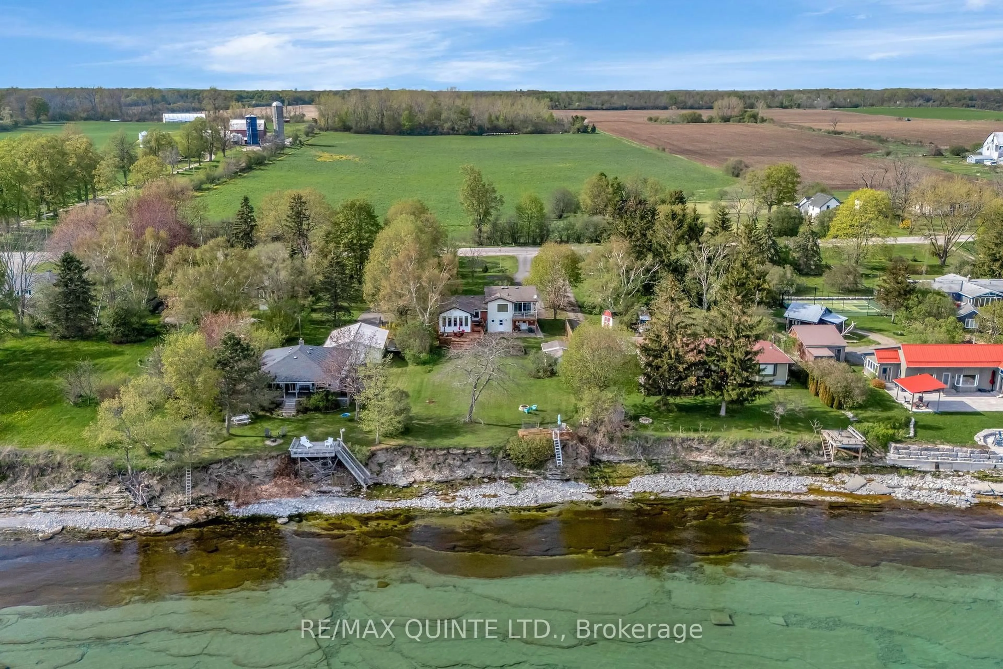 A pic from outside/outdoor area/front of a property/back of a property/a pic from drone, water/lake/river/ocean view for 17035 Loyalist Pkwy, Prince Edward County Ontario K0K 3L0