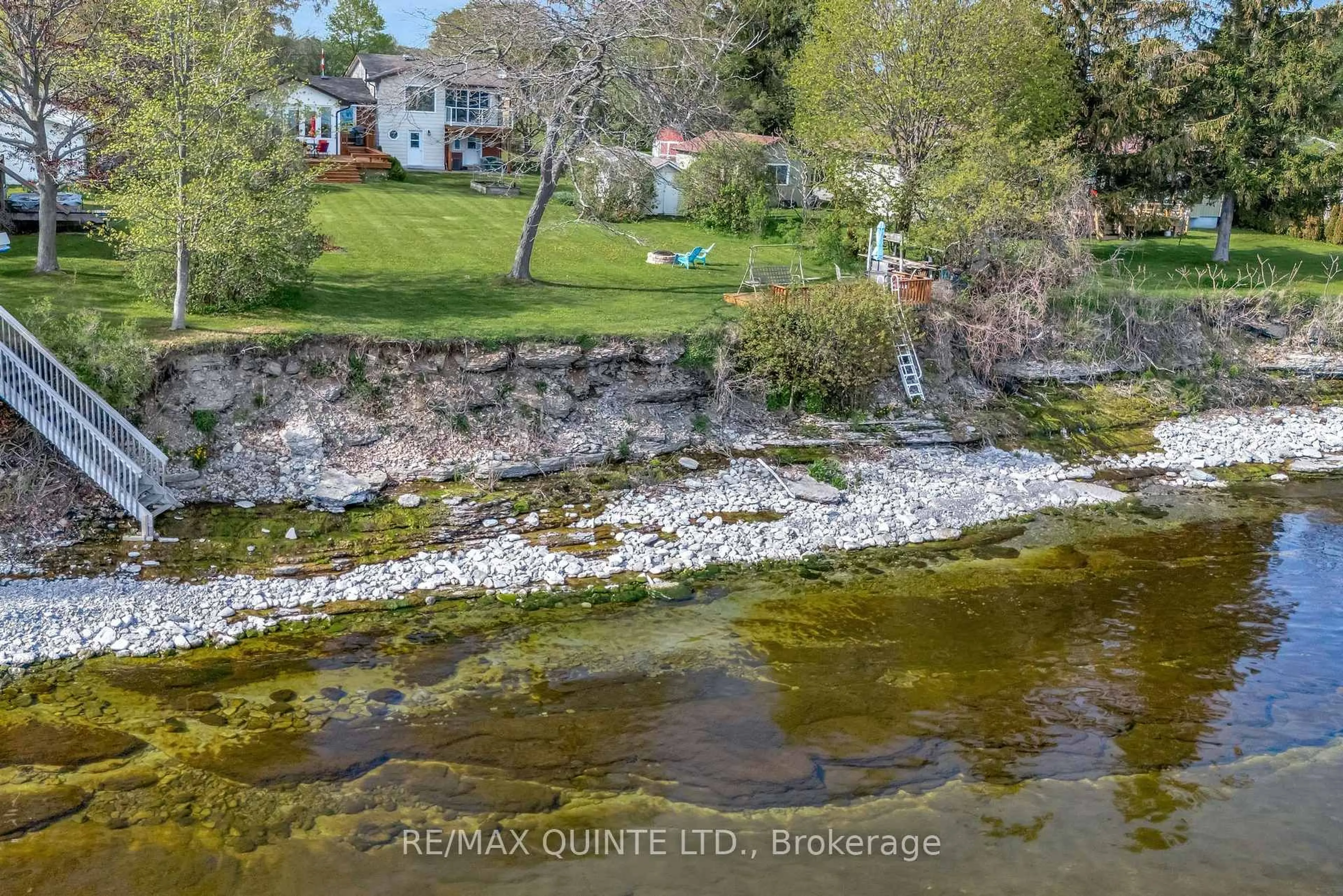 A pic from outside/outdoor area/front of a property/back of a property/a pic from drone, water/lake/river/ocean view for 17035 Loyalist Pkwy, Prince Edward County Ontario K0K 3L0