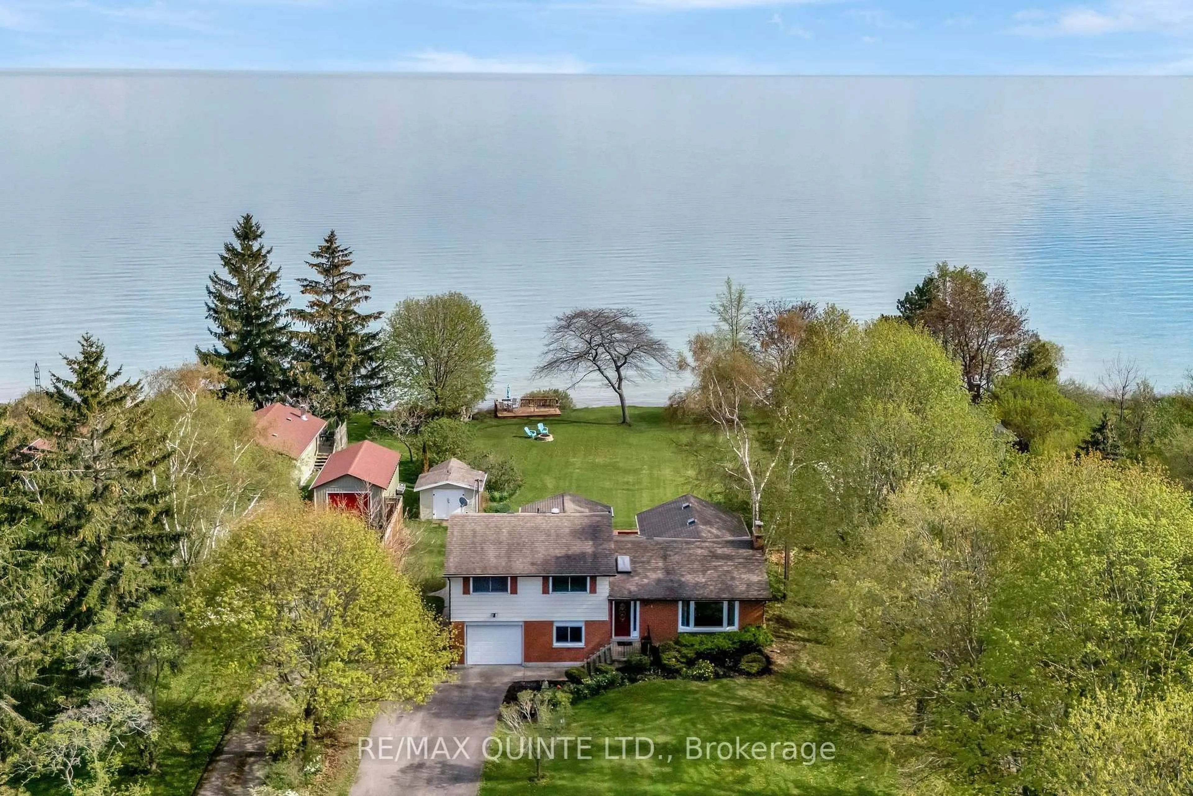 A pic from outside/outdoor area/front of a property/back of a property/a pic from drone, water/lake/river/ocean view for 17035 Loyalist Pkwy, Prince Edward County Ontario K0K 3L0