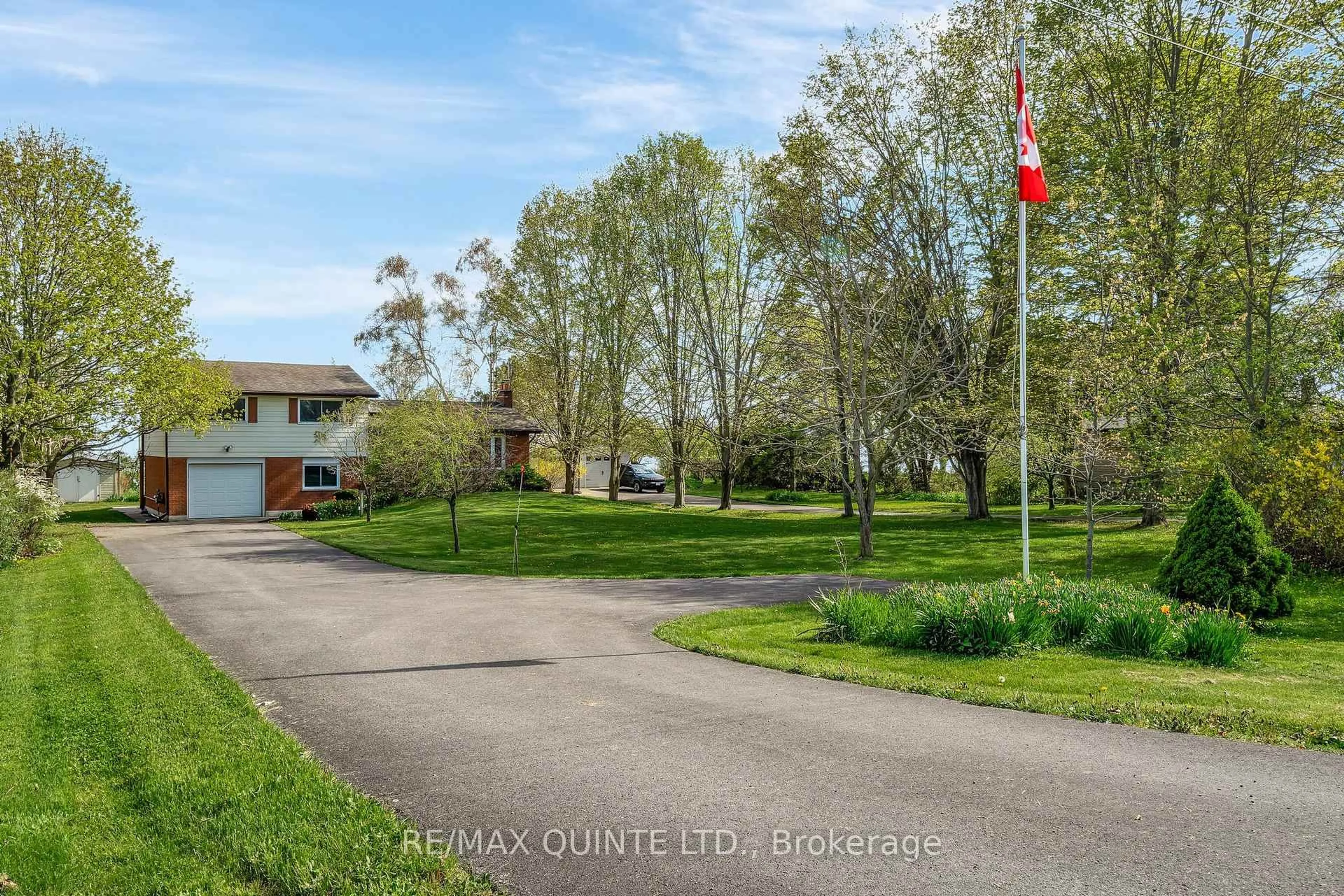 A pic from outside/outdoor area/front of a property/back of a property/a pic from drone, street for 17035 Loyalist Pkwy, Prince Edward County Ontario K0K 3L0