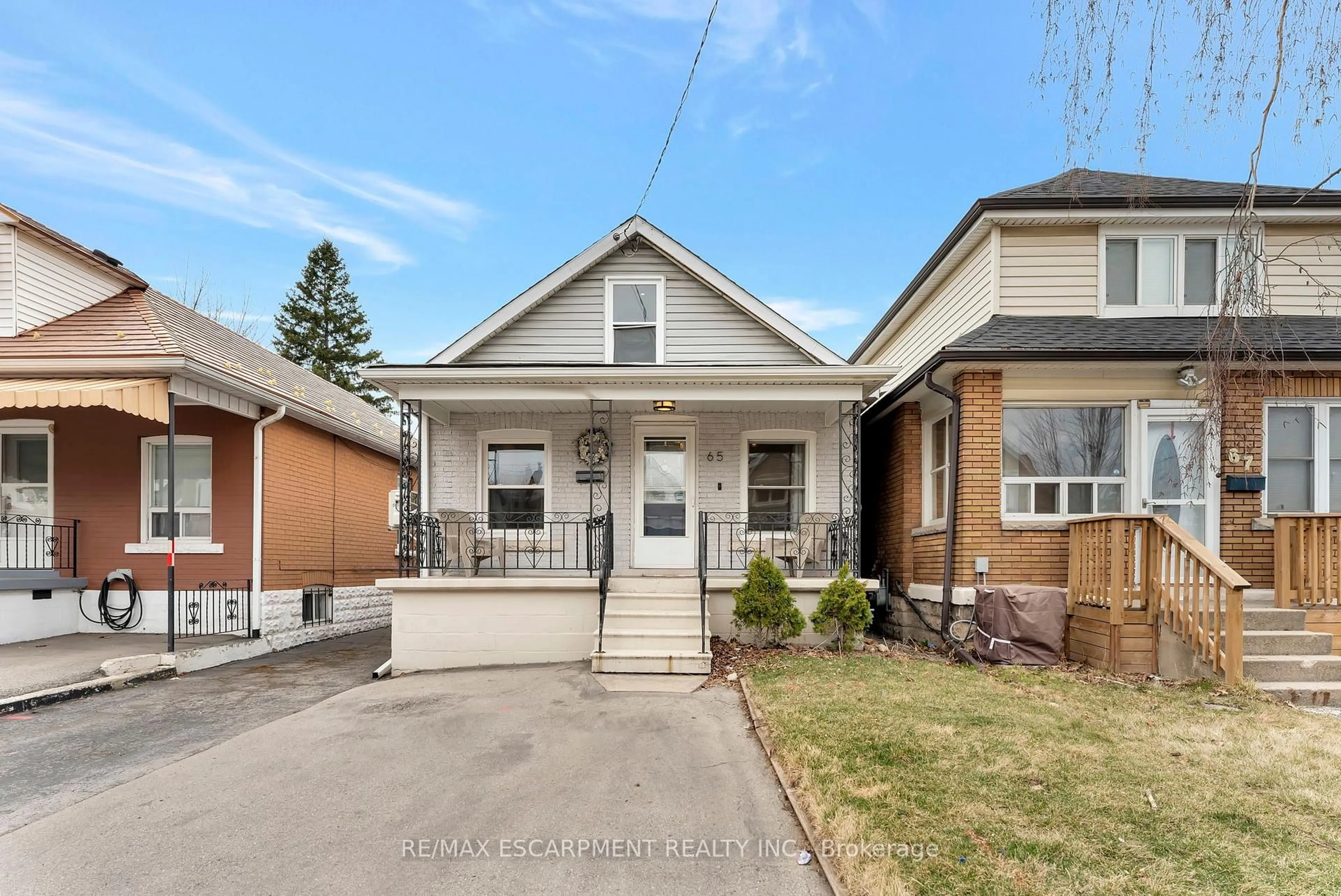 Home with brick exterior material, street for 65 Connaught Ave, Hamilton Ontario L8L 6Y9