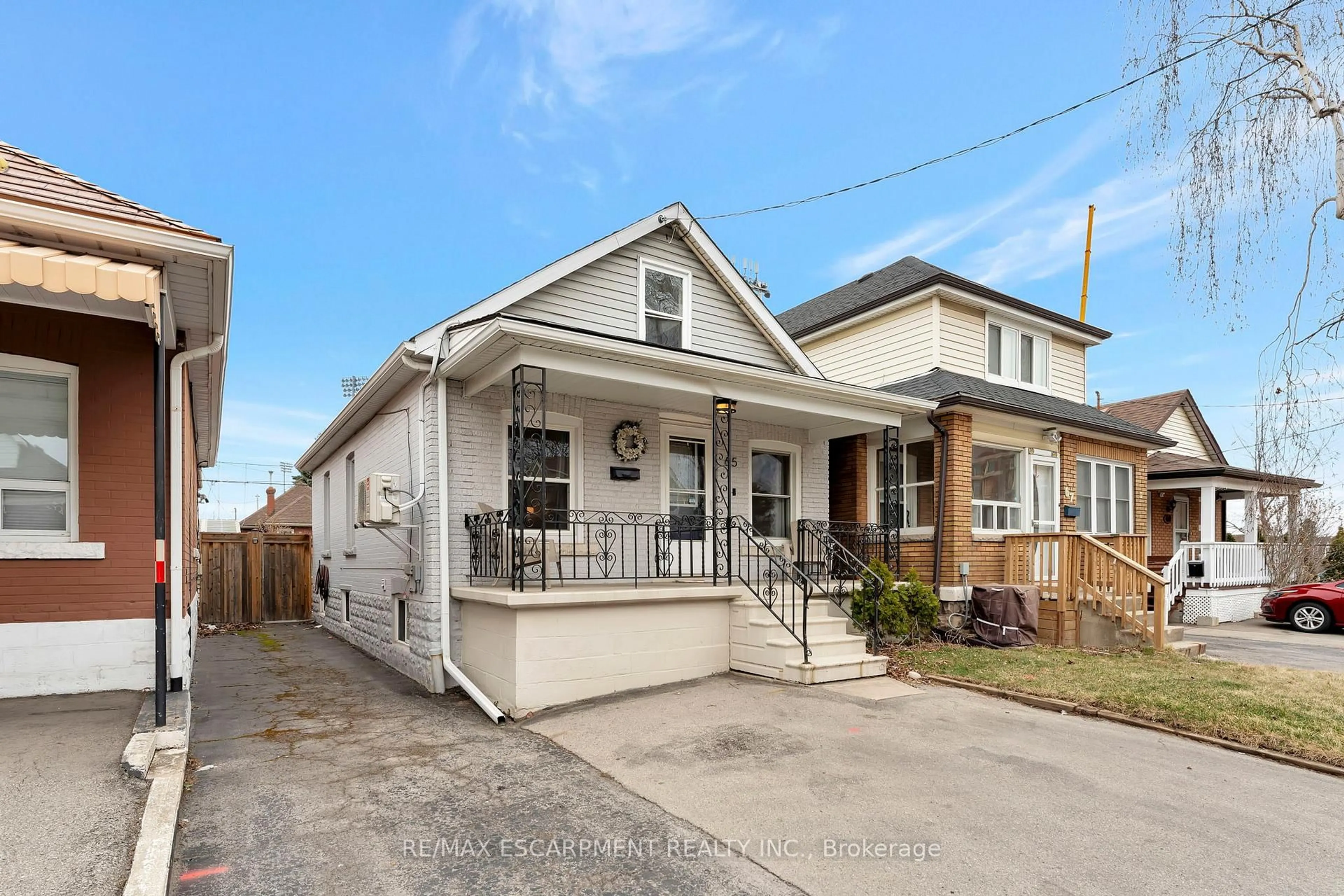 Home with brick exterior material, street for 65 Connaught Ave, Hamilton Ontario L8L 6Y9