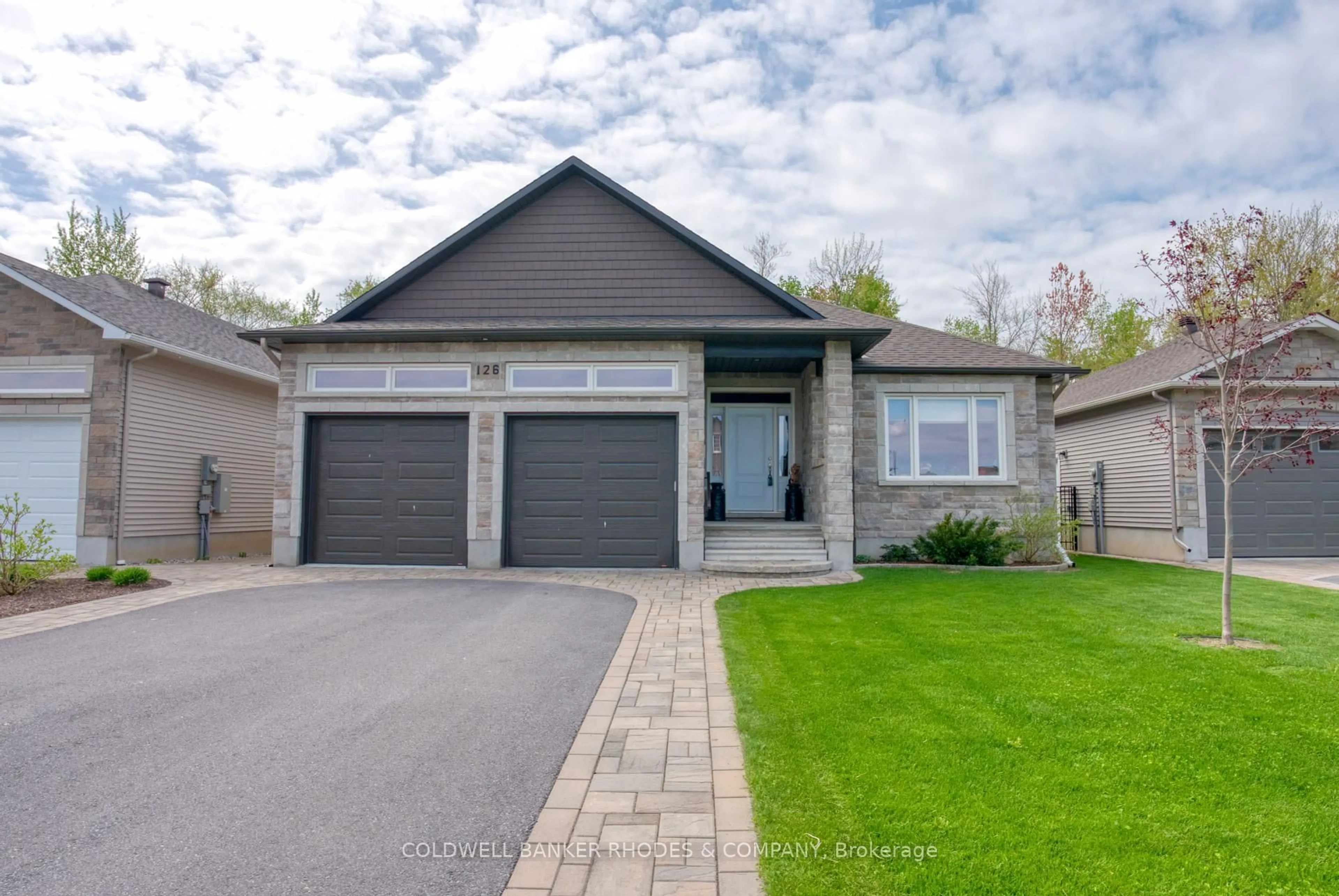 Home with brick exterior material, street for 126 Pioneer Rd, Russell Ontario K4R 0C9