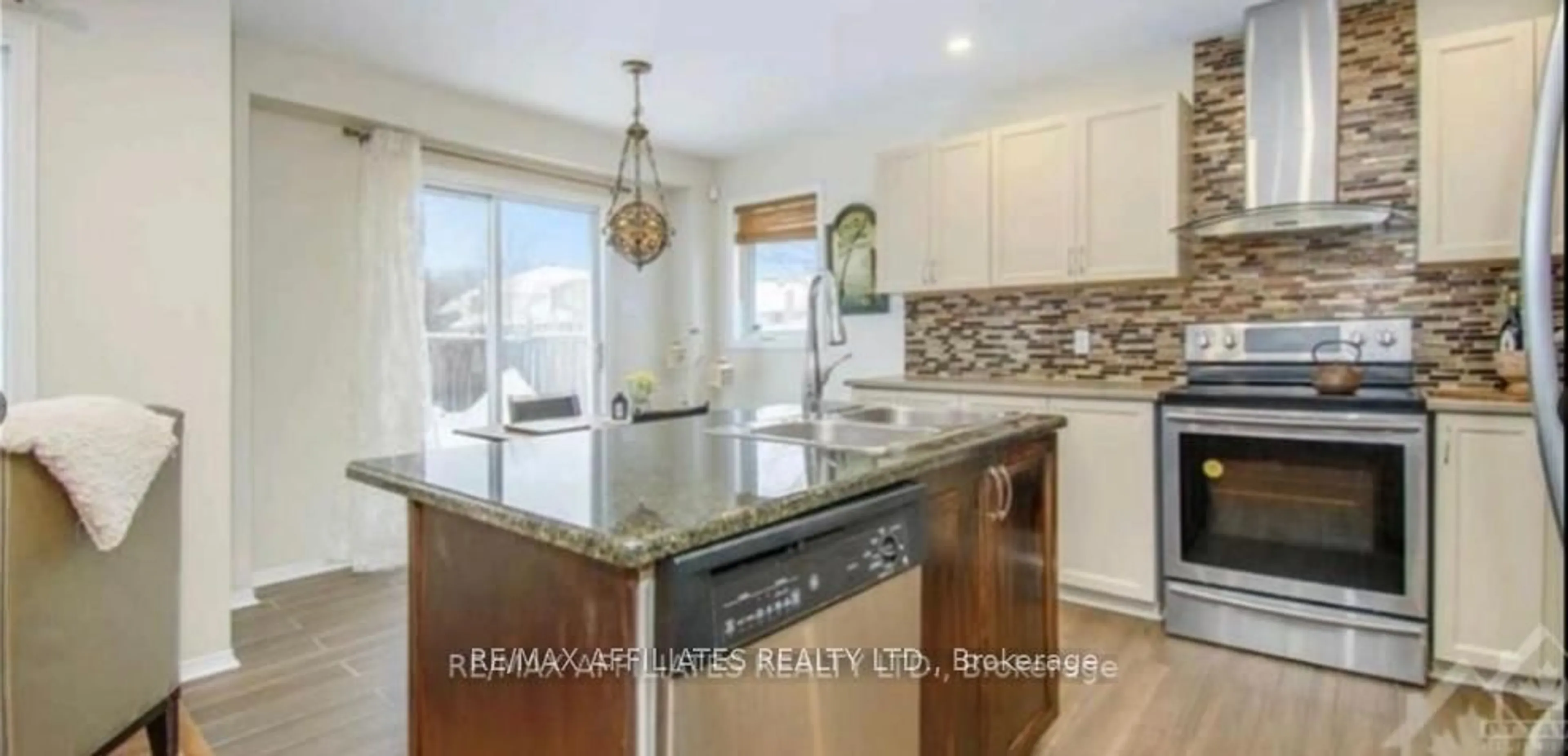 Open concept kitchen, ceramic/tile floor for 1040 CAPREOL St, Ottawa Ontario K4A 4Z9