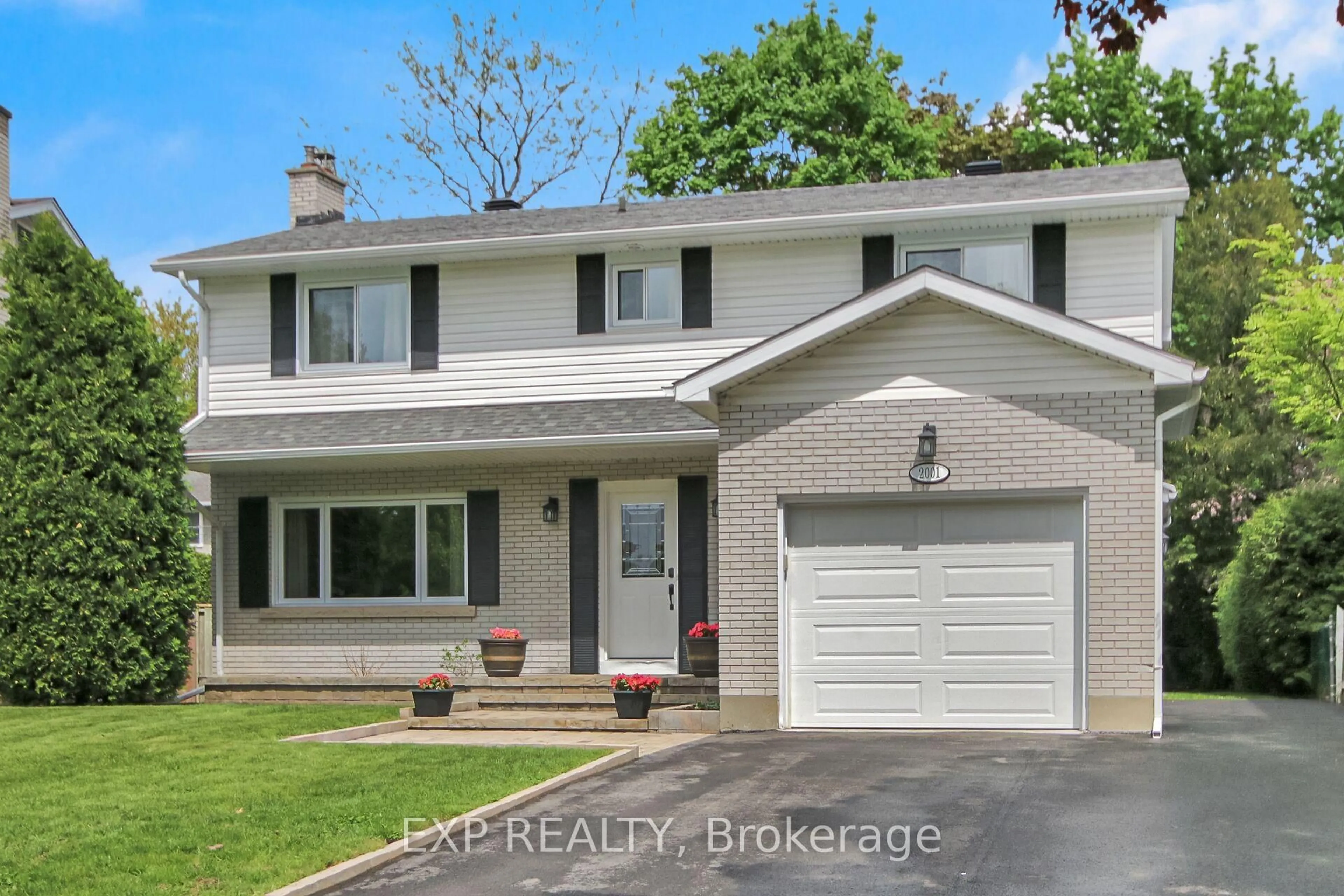 Home with brick exterior material, street for 2001 Neepawa Ave, Ottawa Ontario K2A 3L4