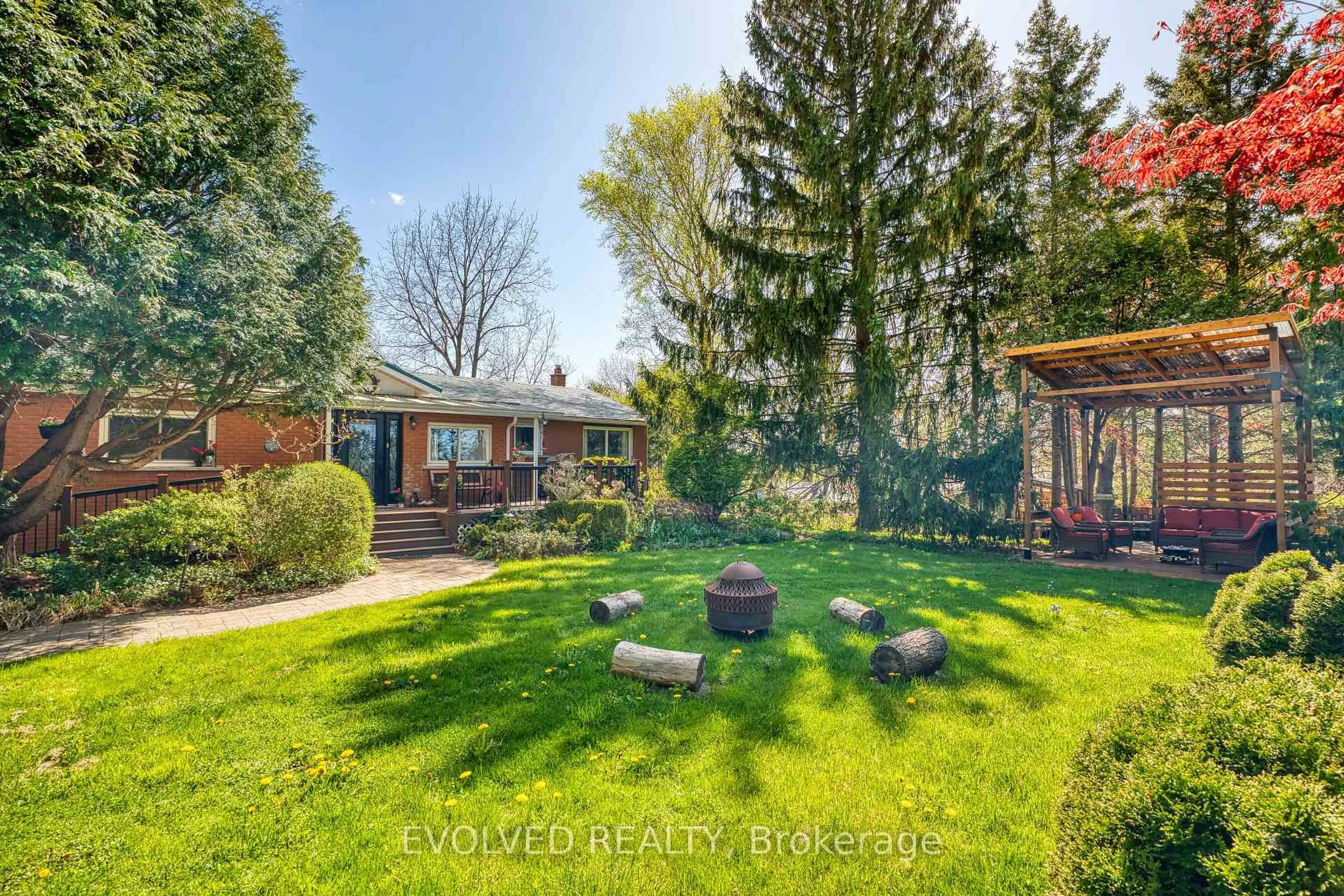 A pic from outside/outdoor area/front of a property/back of a property/a pic from drone, forest/trees view for 1336 Safari Rd, Hamilton Ontario L0R 1V0