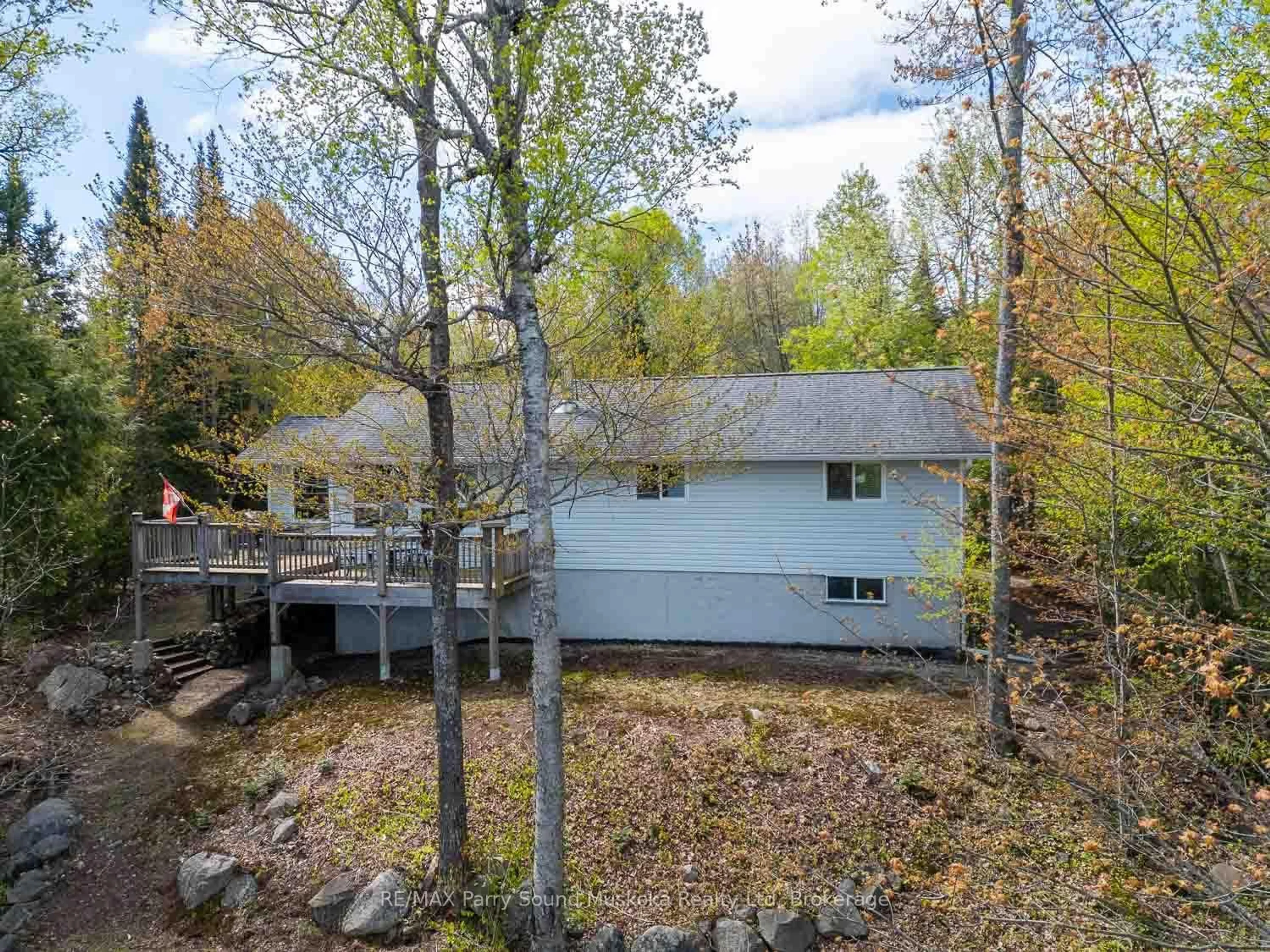 A pic from outside/outdoor area/front of a property/back of a property/a pic from drone, forest/trees view for 1931 B South Horn Lake Rd, Magnetawan Ontario P0A 1C0