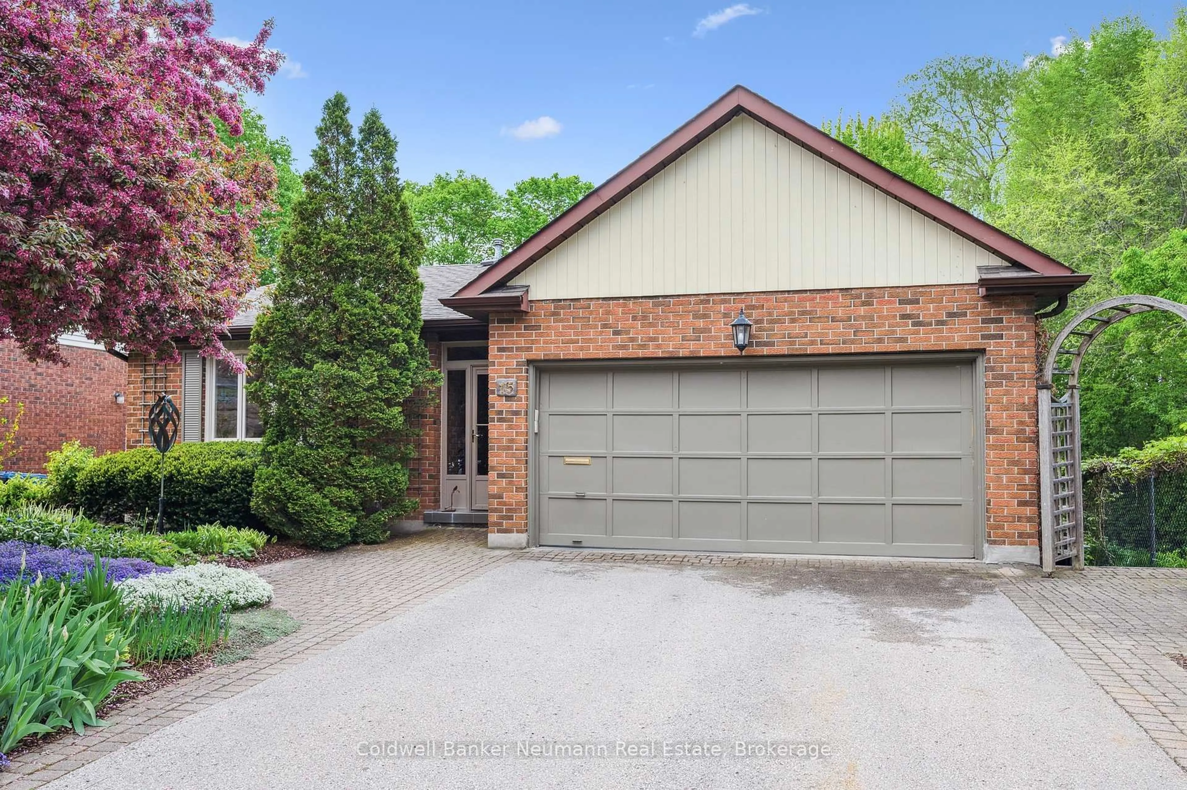 Home with brick exterior material, street for 15 Wagoners Tr, Guelph Ontario N1G 3M9