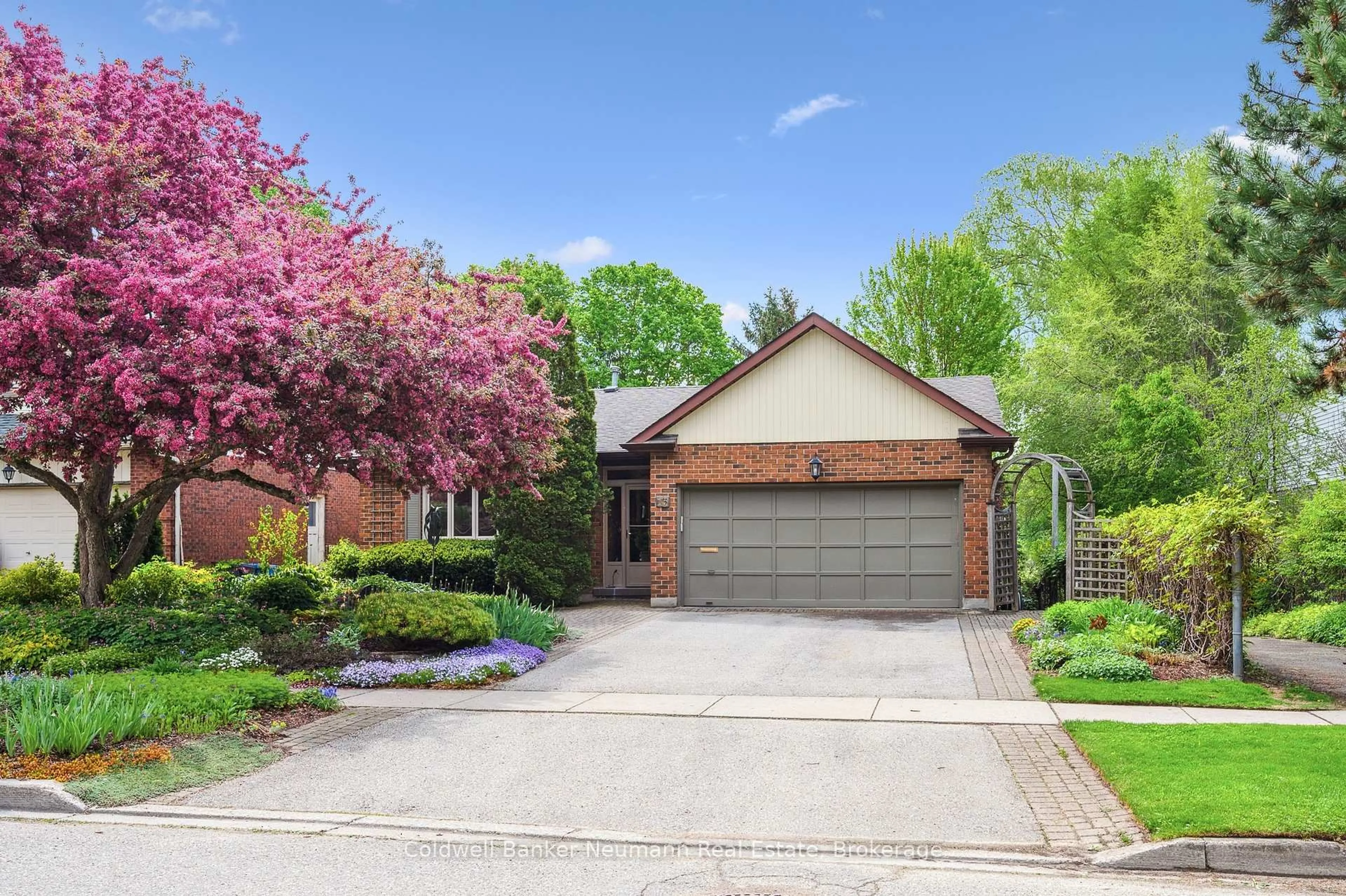 Home with brick exterior material, street for 15 Wagoners Tr, Guelph Ontario N1G 3M9