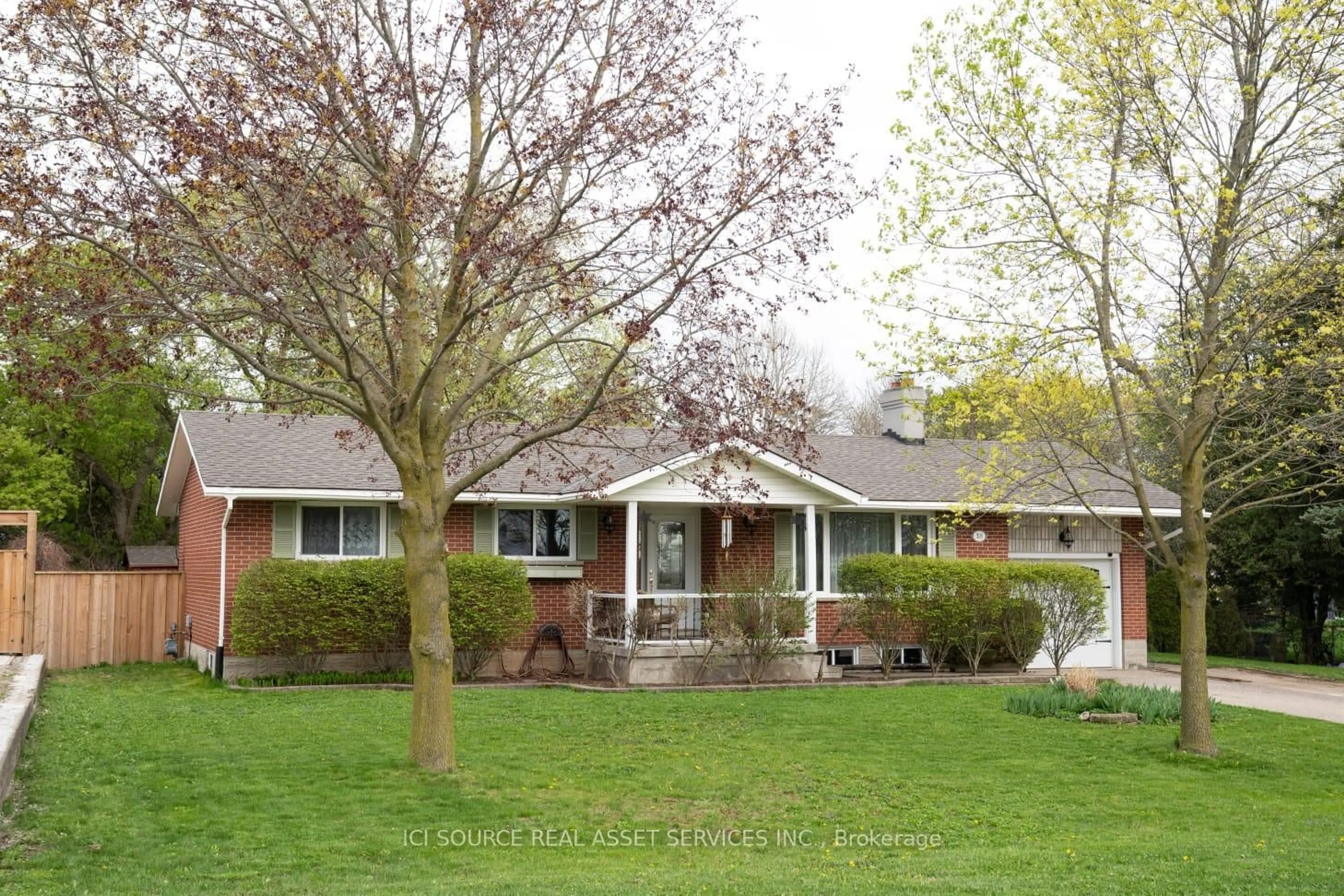 Home with vinyl exterior material, street for 18 Marshall Ave, North Dumfries Ontario N0B 1E0