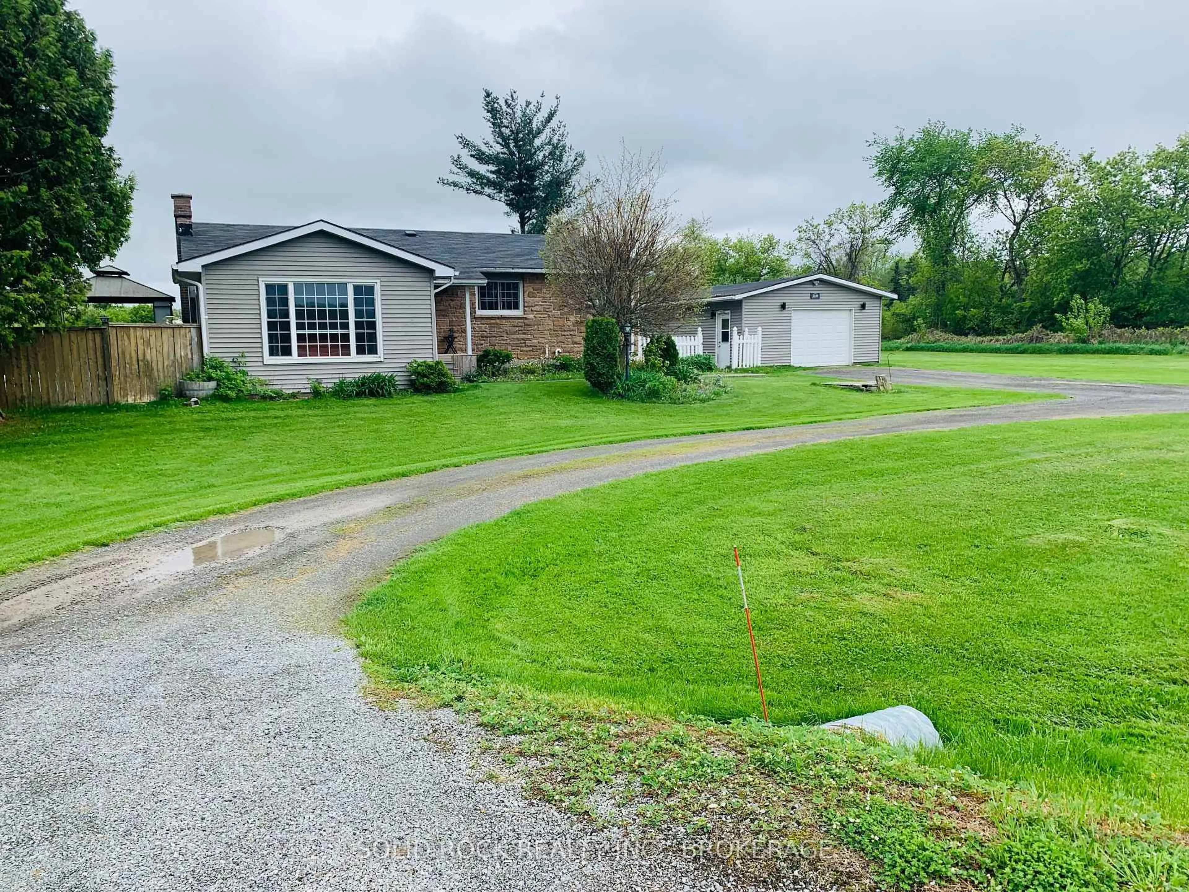 A pic from outside/outdoor area/front of a property/back of a property/a pic from drone, street for 2339 Washburn Rd, Inverary Ontario K0H 1X0