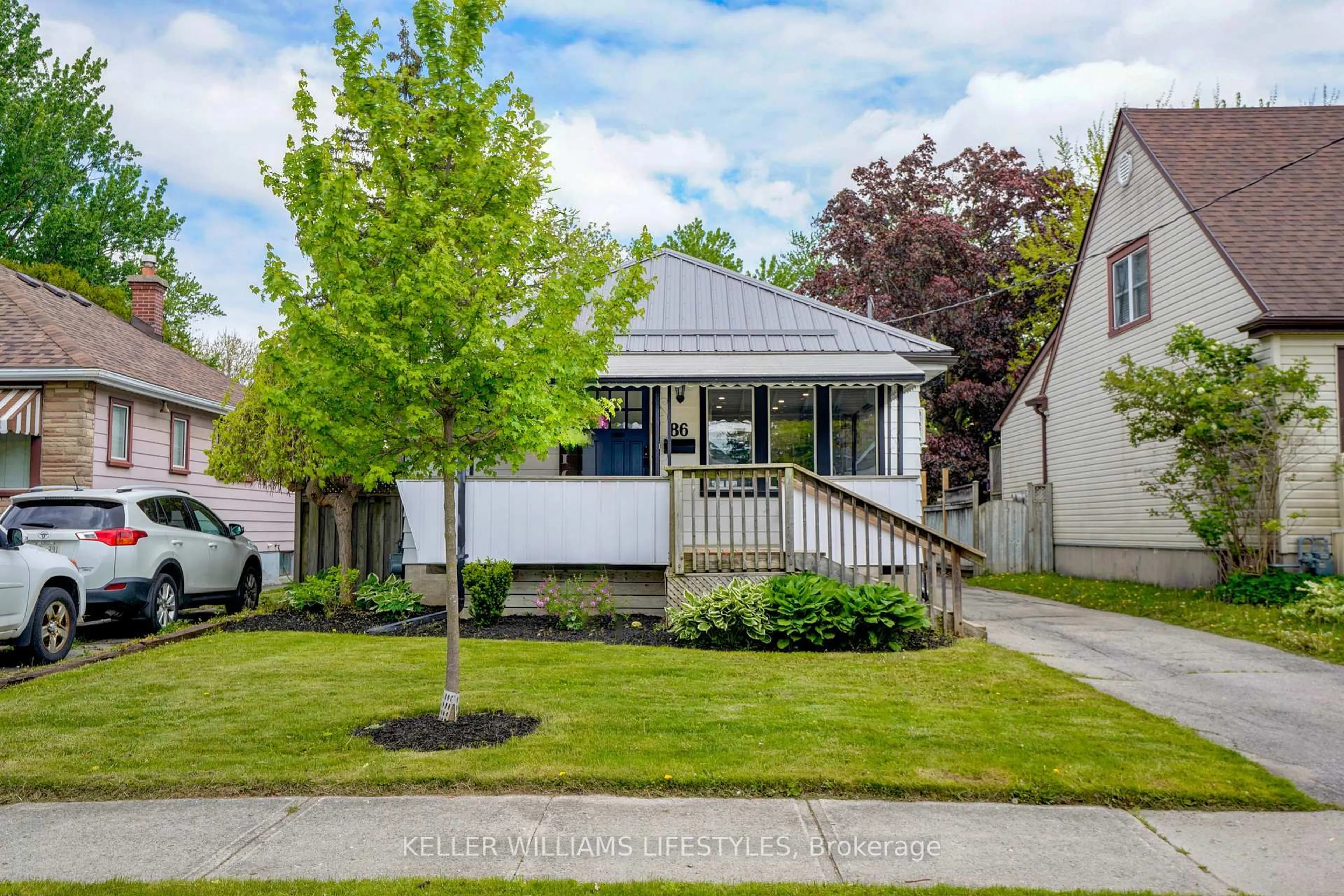 Home with vinyl exterior material, street for 86 Sterling St, London East Ontario N5Y 1Y7