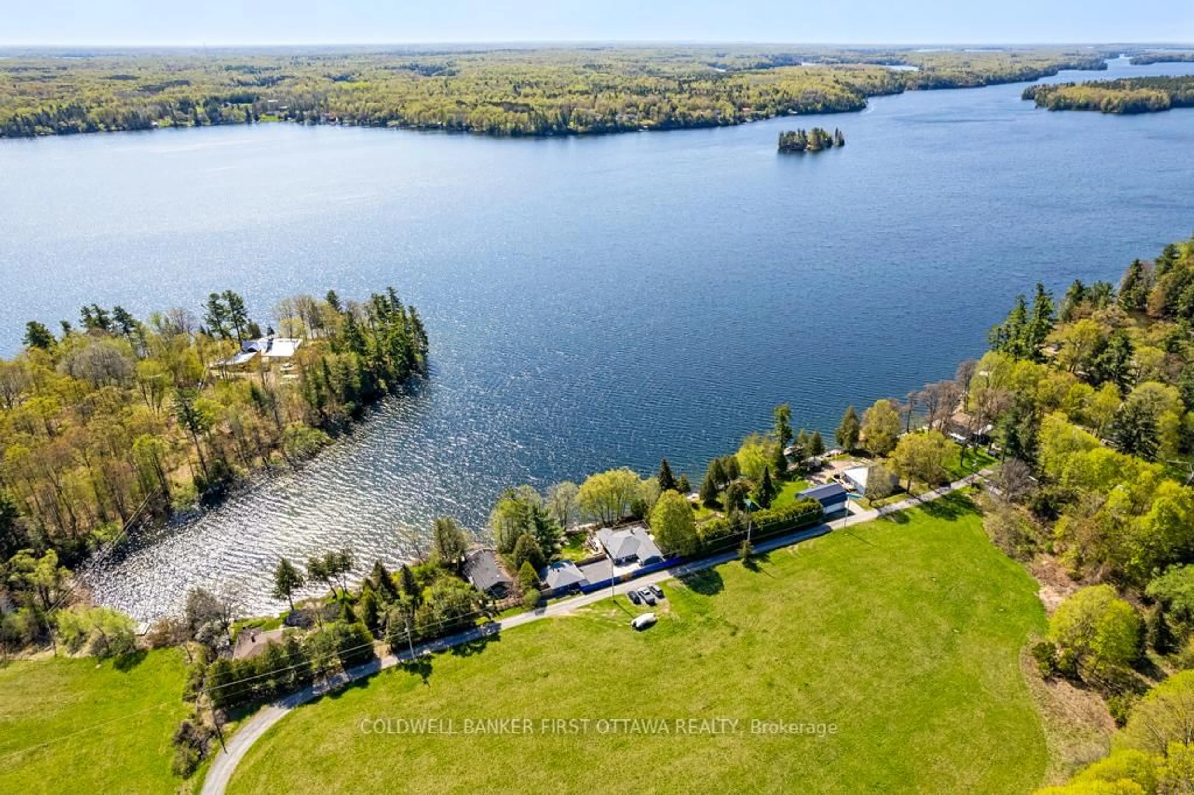 A pic from outside/outdoor area/front of a property/back of a property/a pic from drone, water/lake/river/ocean view for 889 Jones Point Rd, Perth Ontario K7H 3C7