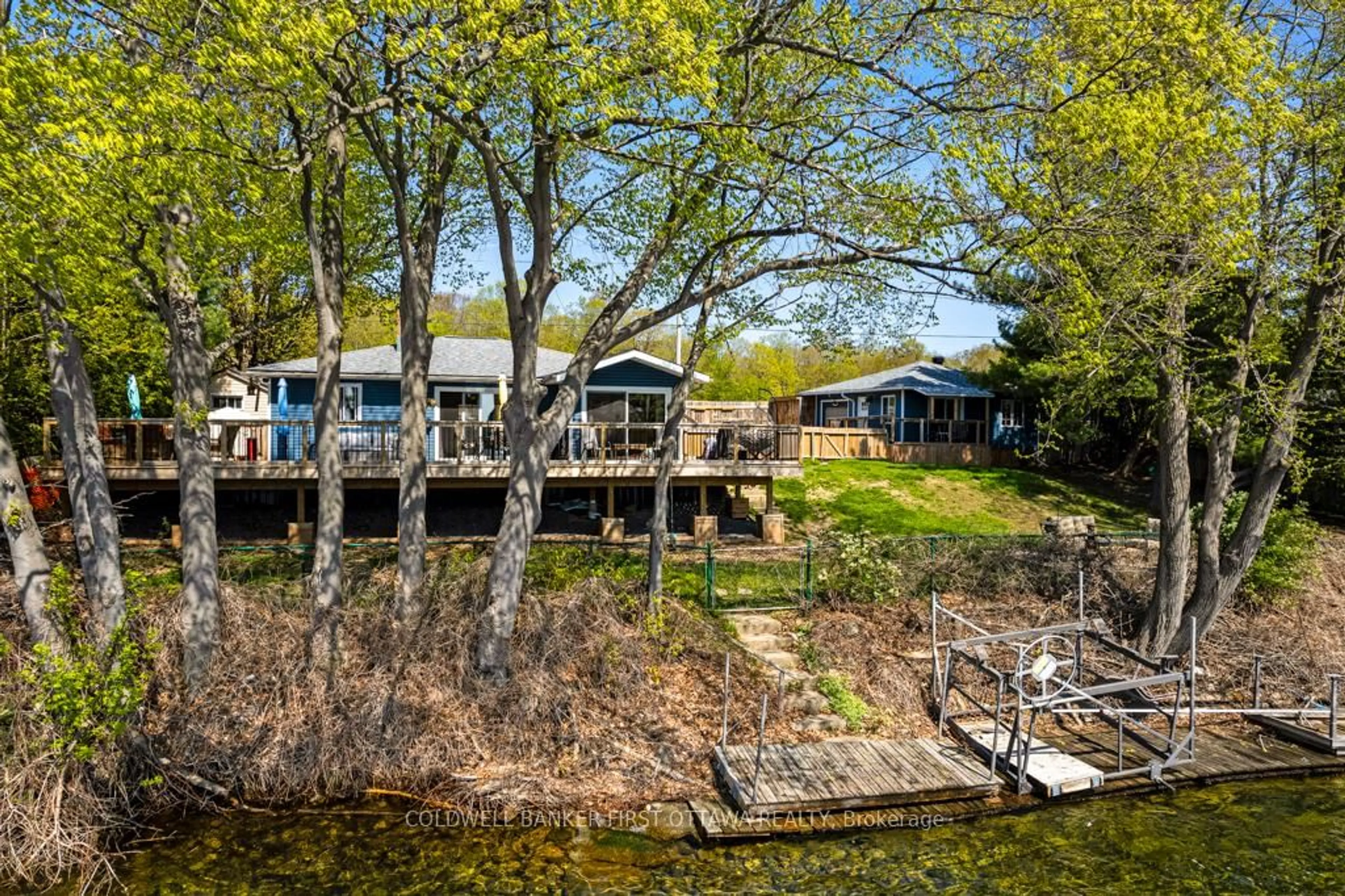 A pic from outside/outdoor area/front of a property/back of a property/a pic from drone, water/lake/river/ocean view for 889 Jones Point Rd, Perth Ontario K7H 3C7