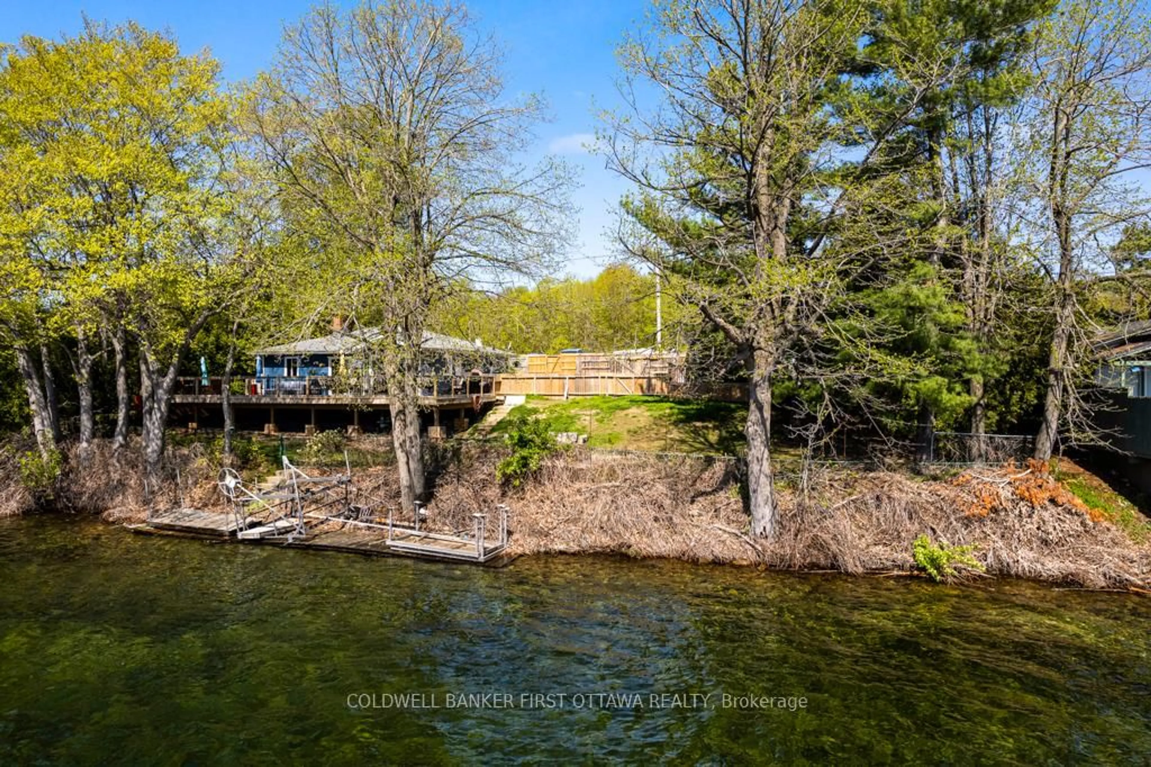 A pic from outside/outdoor area/front of a property/back of a property/a pic from drone, water/lake/river/ocean view for 889 Jones Point Rd, Perth Ontario K7H 3C7