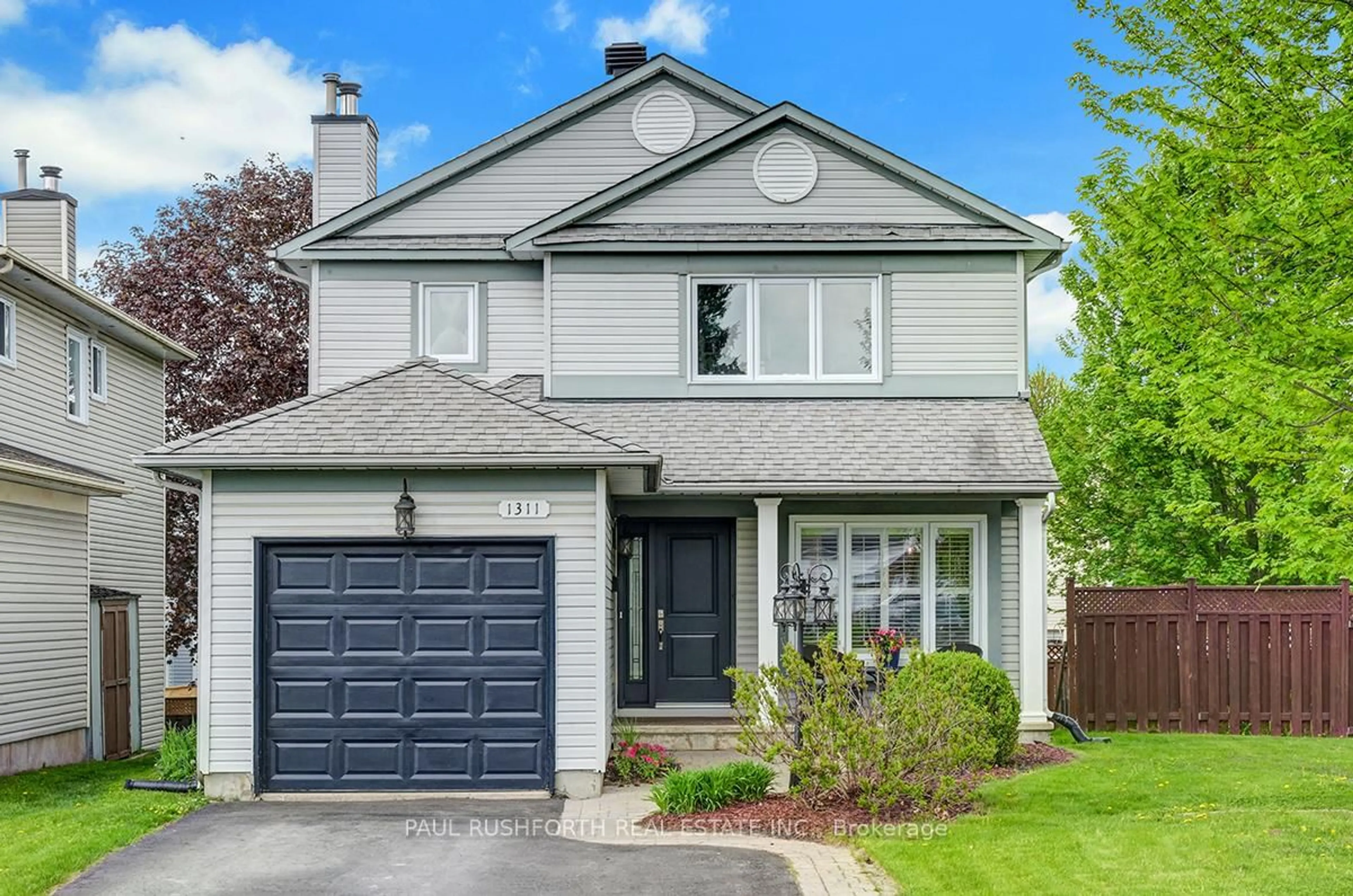 Home with vinyl exterior material, street for 1311 Parc Du Village St, Ottawa Ontario K1C 7B2