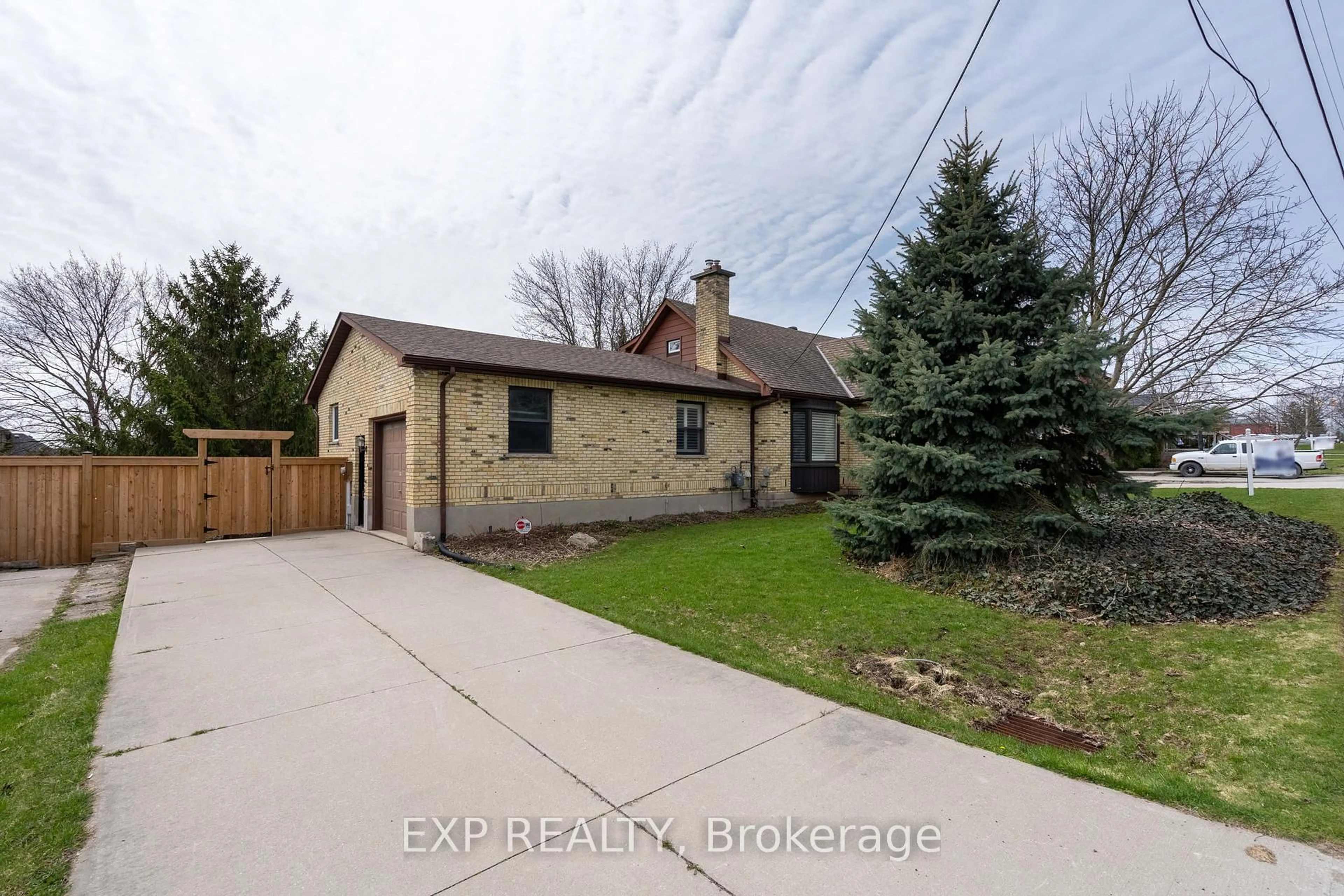 Home with brick exterior material, street for 13379 Ilderton Rd, Middlesex Centre Ontario N0M 2A0