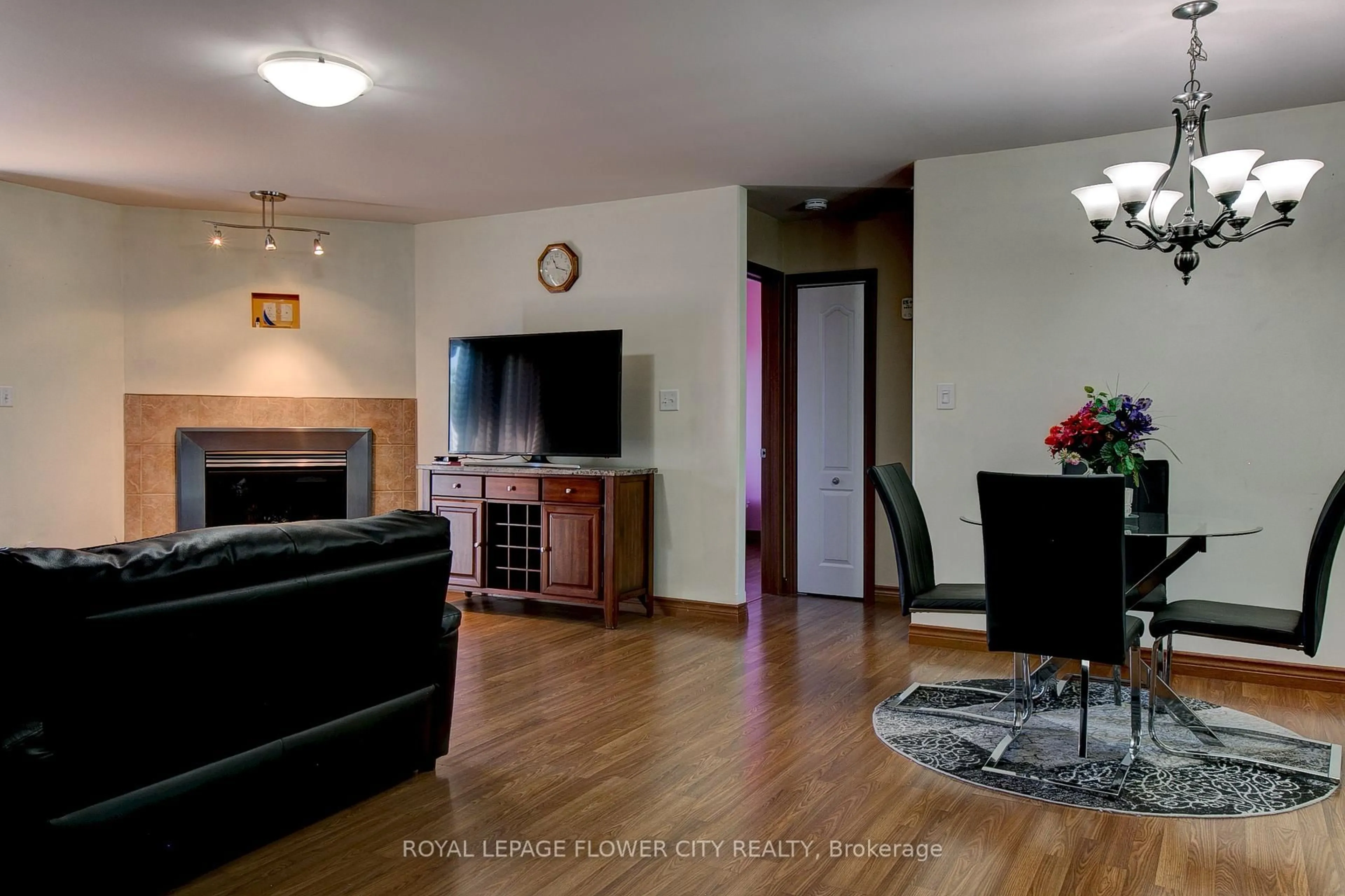 Living room with furniture, wood/laminate floor for 1391 Crosswinds Dr, Lakeshore Ontario N8L 0S6