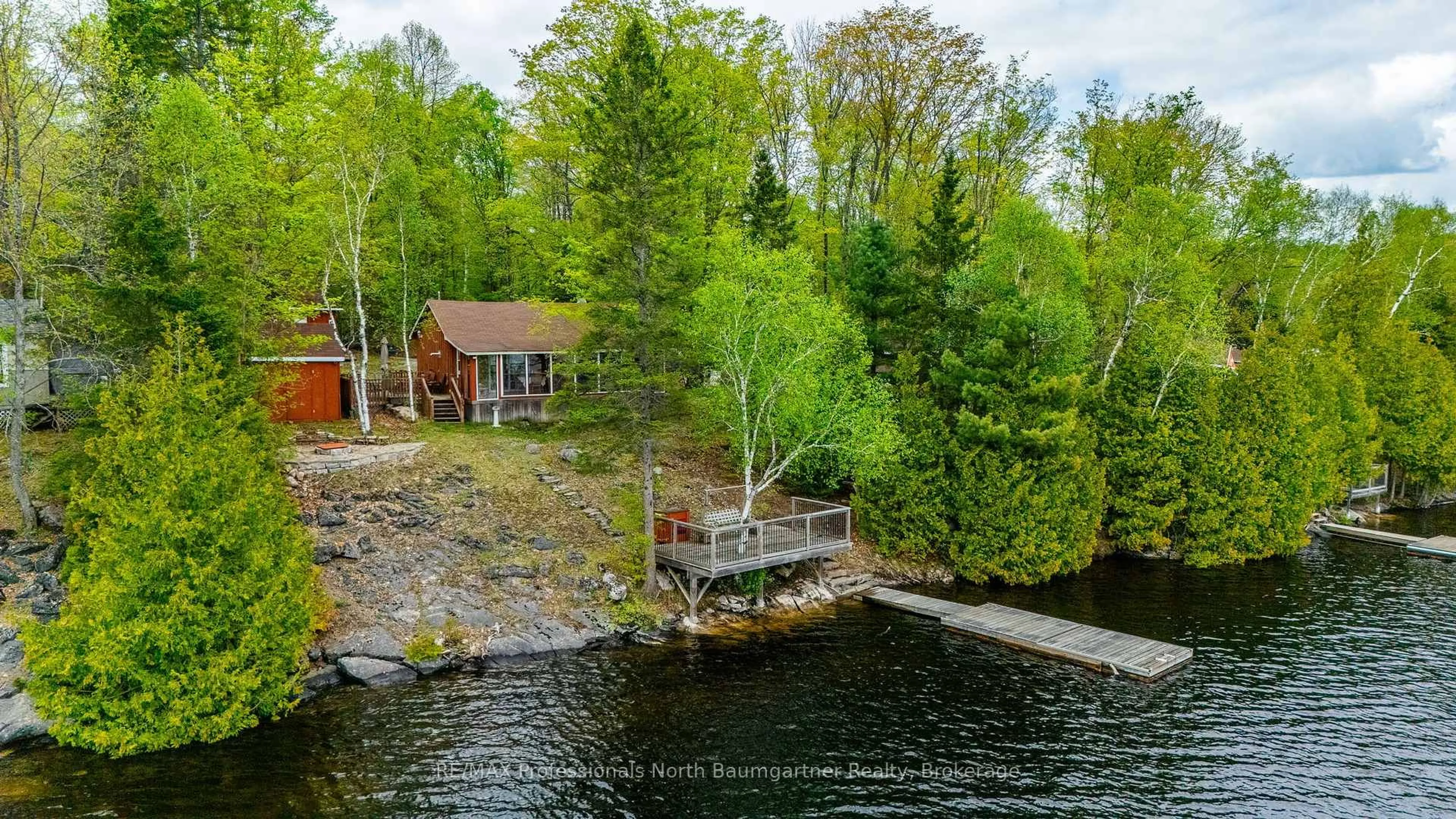 A pic from outside/outdoor area/front of a property/back of a property/a pic from drone, water/lake/river/ocean view for 1026 Nelson Lane, Highlands East Ontario K0M 1S0