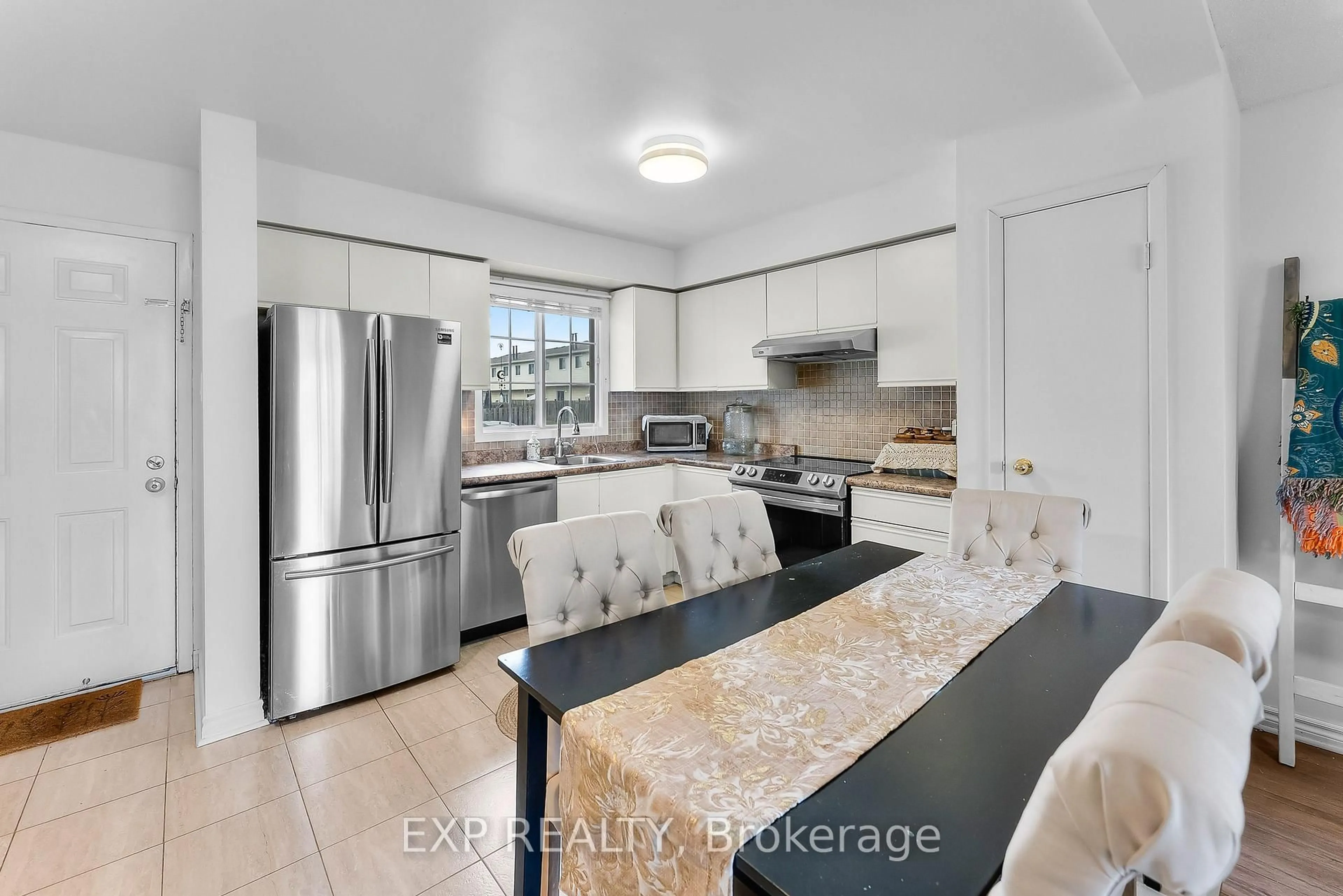 Open concept kitchen, ceramic/tile floor for 8141 Coventry Rd #84, Niagara Falls Ontario L2H 2X7