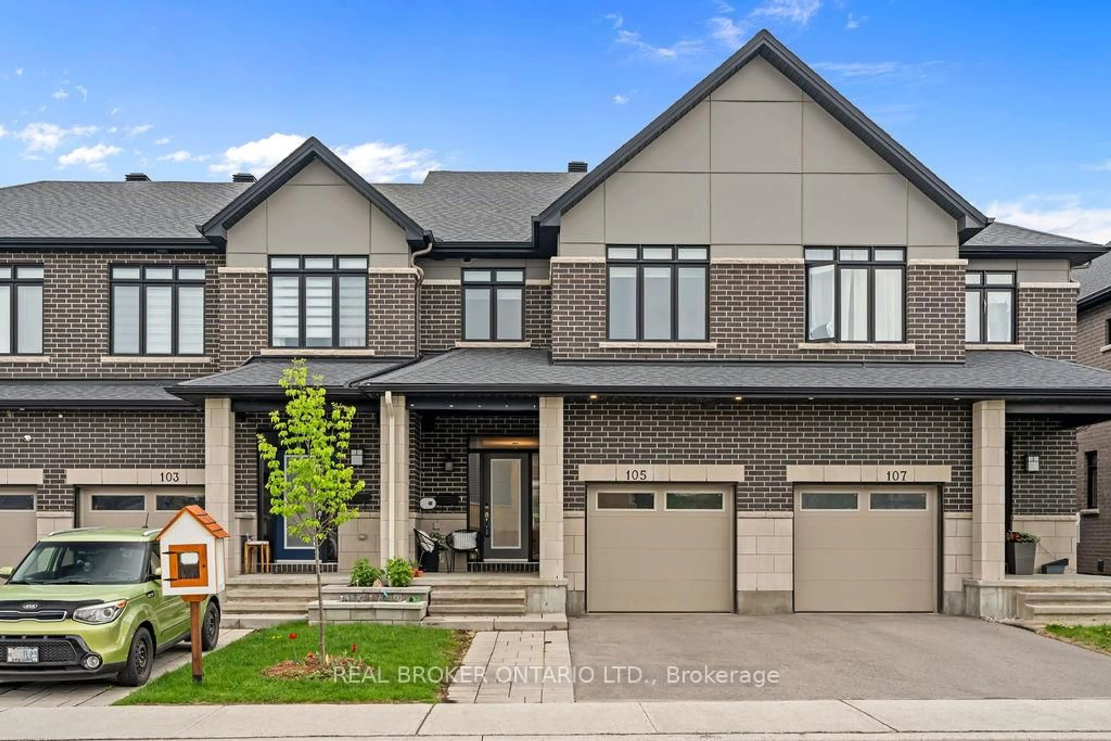 Home with brick exterior material, street for 105 Avro Circ, Ottawa Ontario K1K 3X7