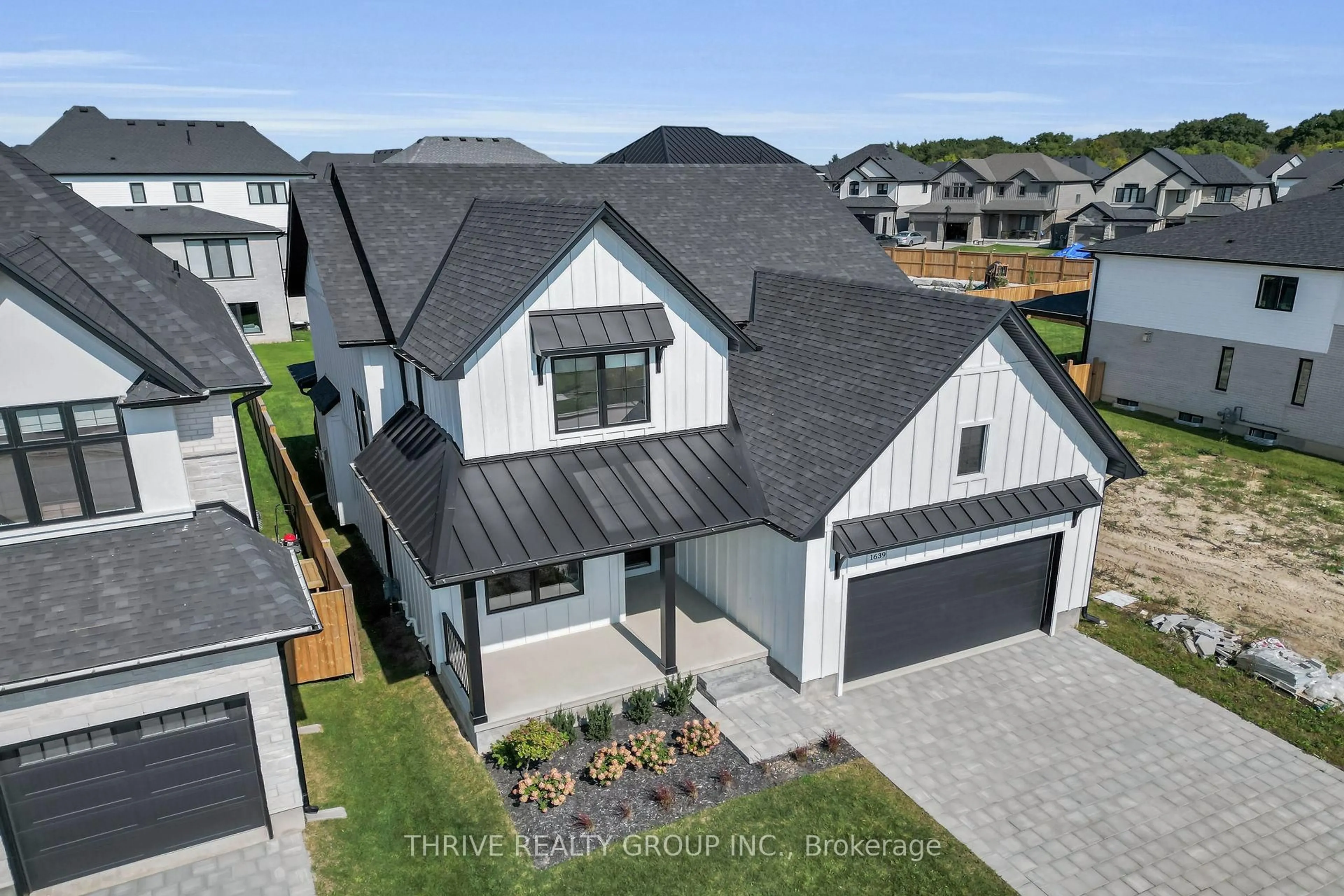 A pic from outside/outdoor area/front of a property/back of a property/a pic from drone, street for 1639 Upper West Ave, London South Ontario N6K 0K6