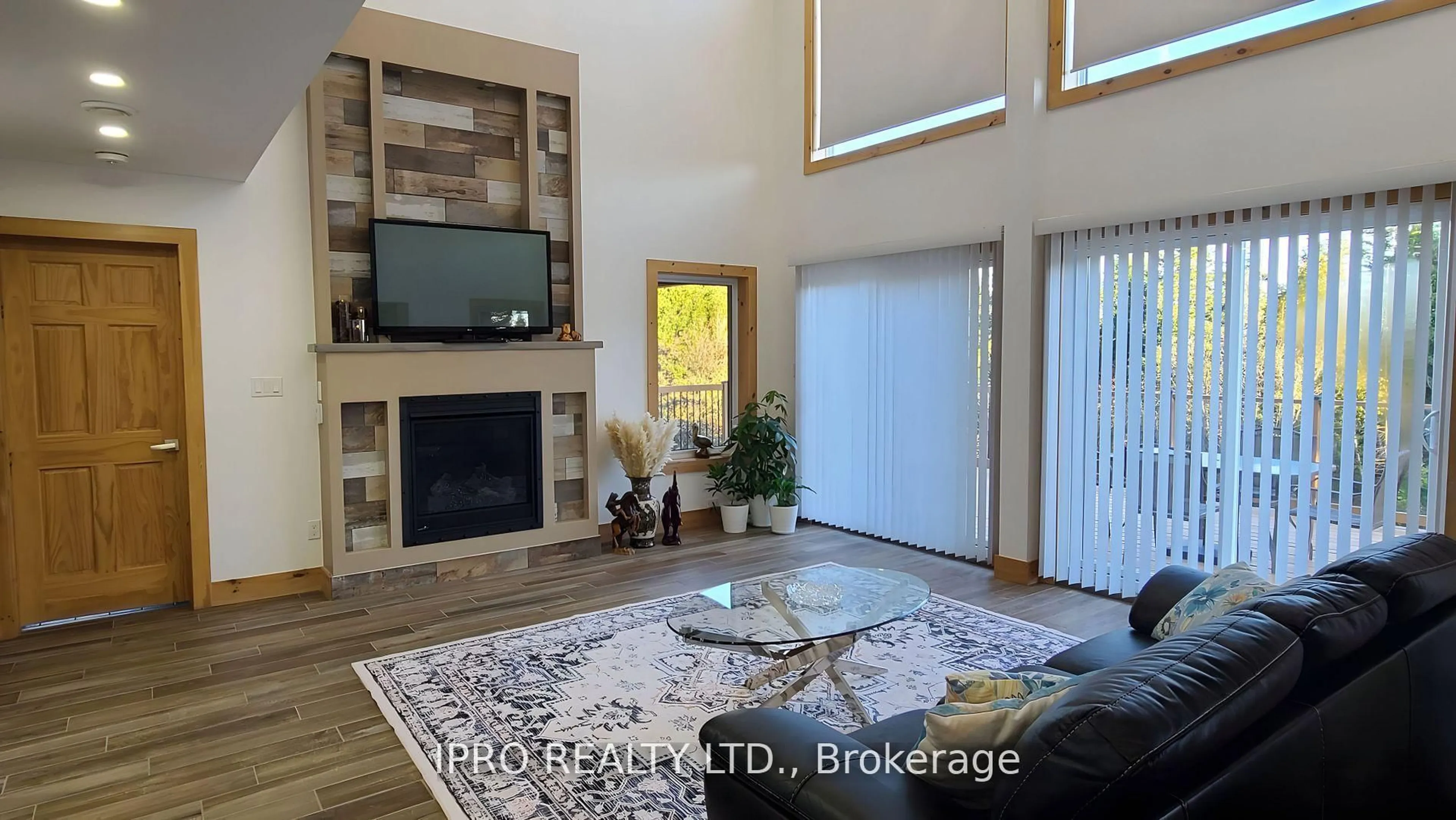 Living room with furniture, wood/laminate floor for 162 Greenough Point Rd, Northern Bruce Peninsula Ontario N0H 2M0