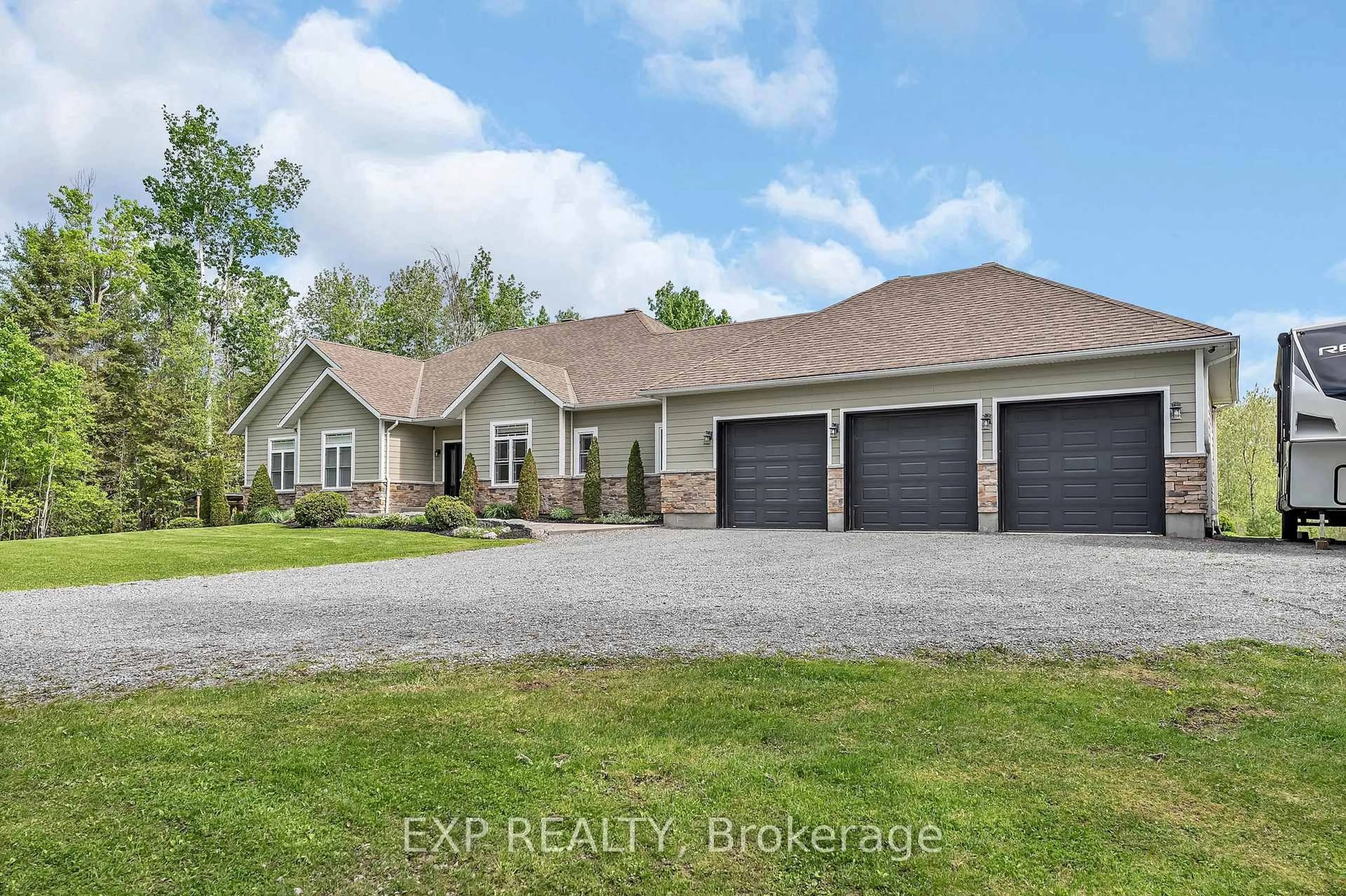 A pic from outside/outdoor area/front of a property/back of a property/a pic from drone, unknown for 155 Wilbert Cox Dr, Carp Ontario K0A 1L0