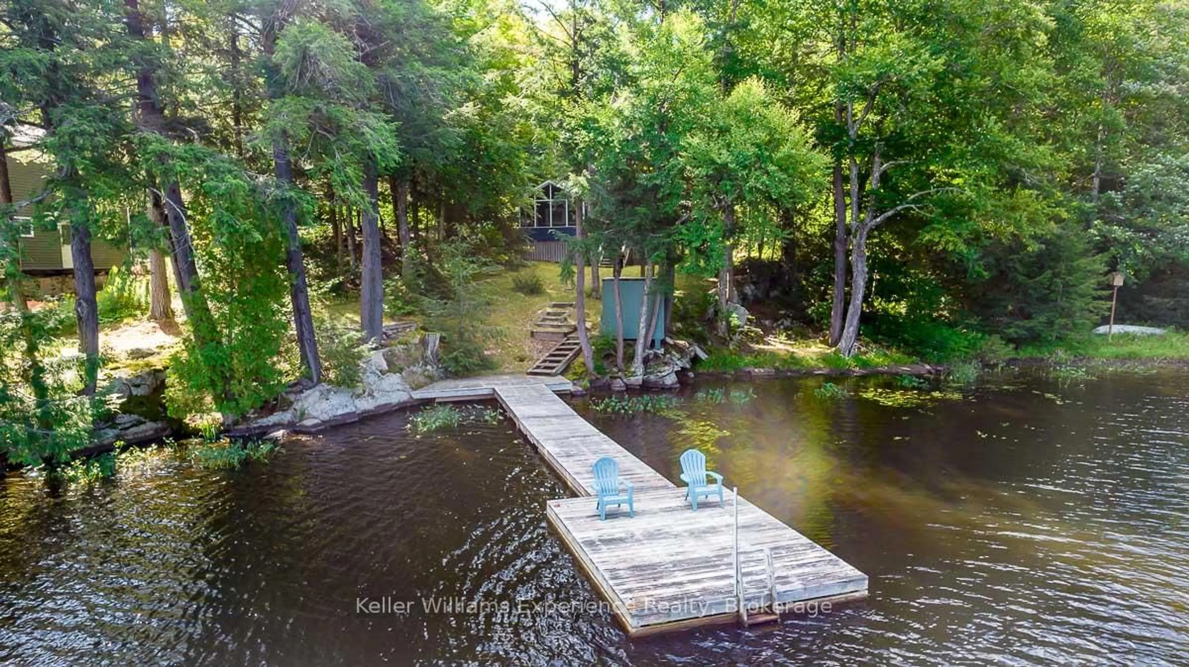 A pic from outside/outdoor area/front of a property/back of a property/a pic from drone, water/lake/river/ocean view for 1123 Stone Gate Lane, Bracebridge Ontario P1L 1X1