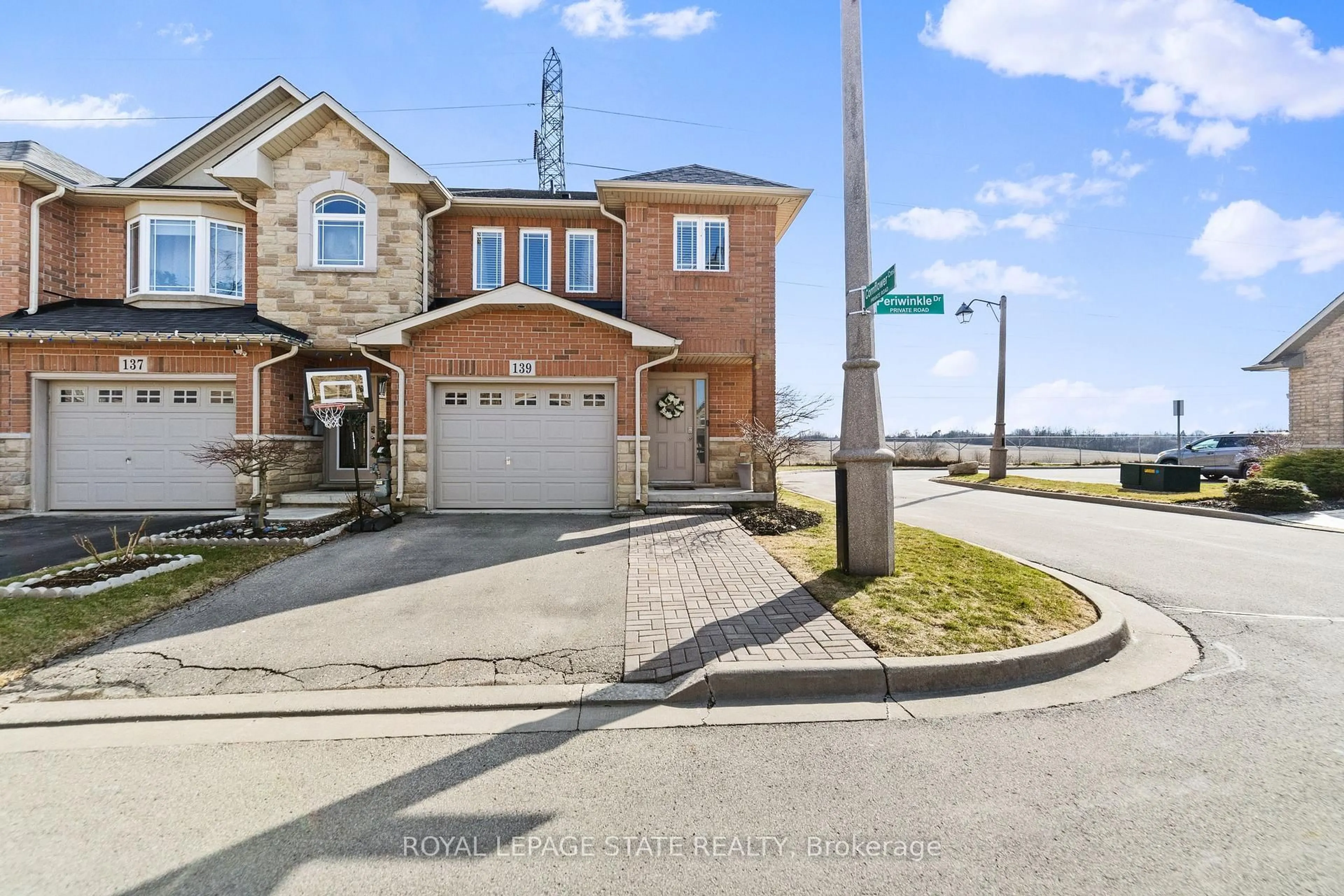 Home with brick exterior material, street for 139 Periwinkle Dr, Hamilton Ontario L0R 1P0