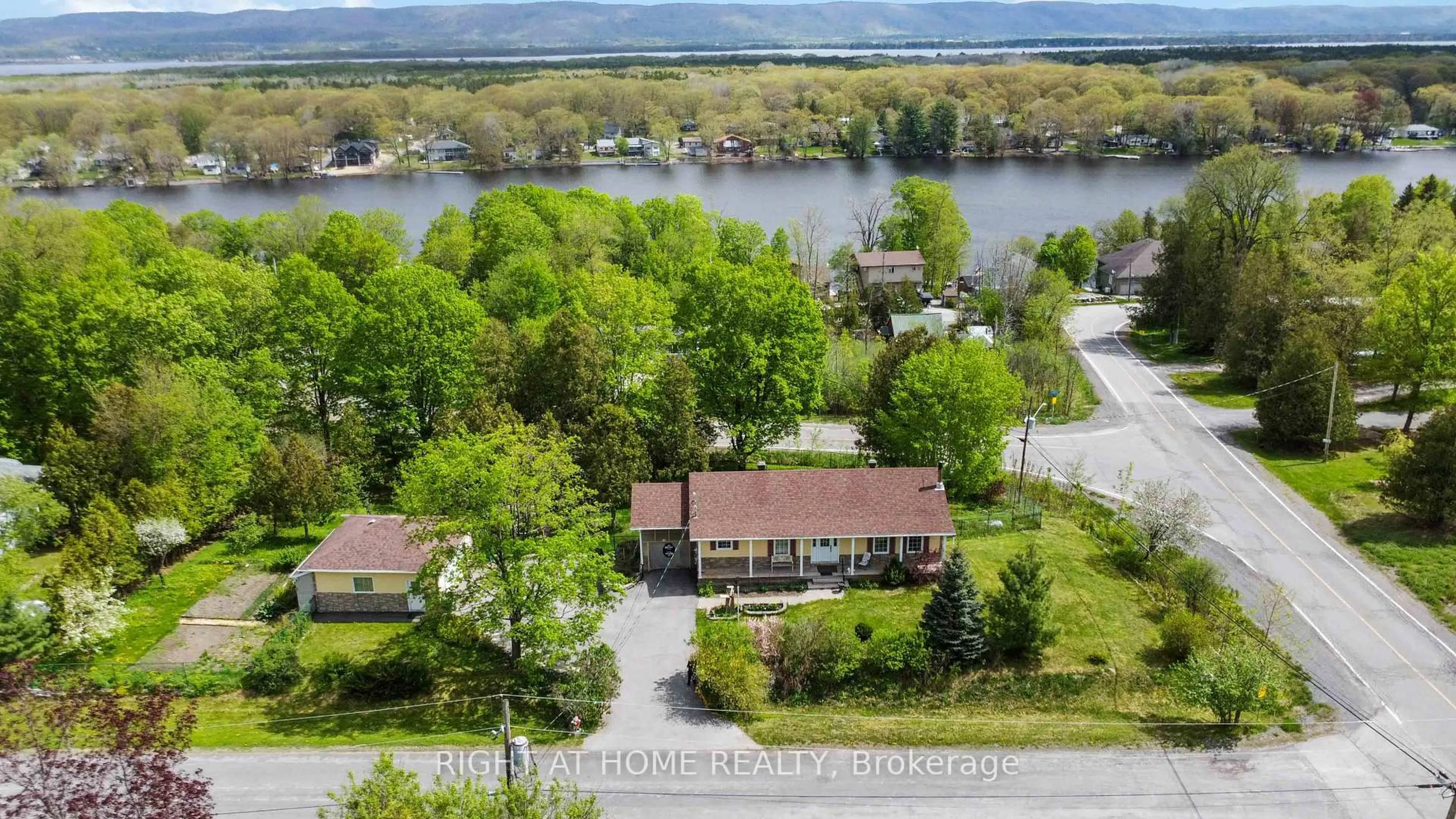 A pic from outside/outdoor area/front of a property/back of a property/a pic from drone, water/lake/river/ocean view for 104 & 110 Highview Dr, Ottawa Ontario K0A 3M0