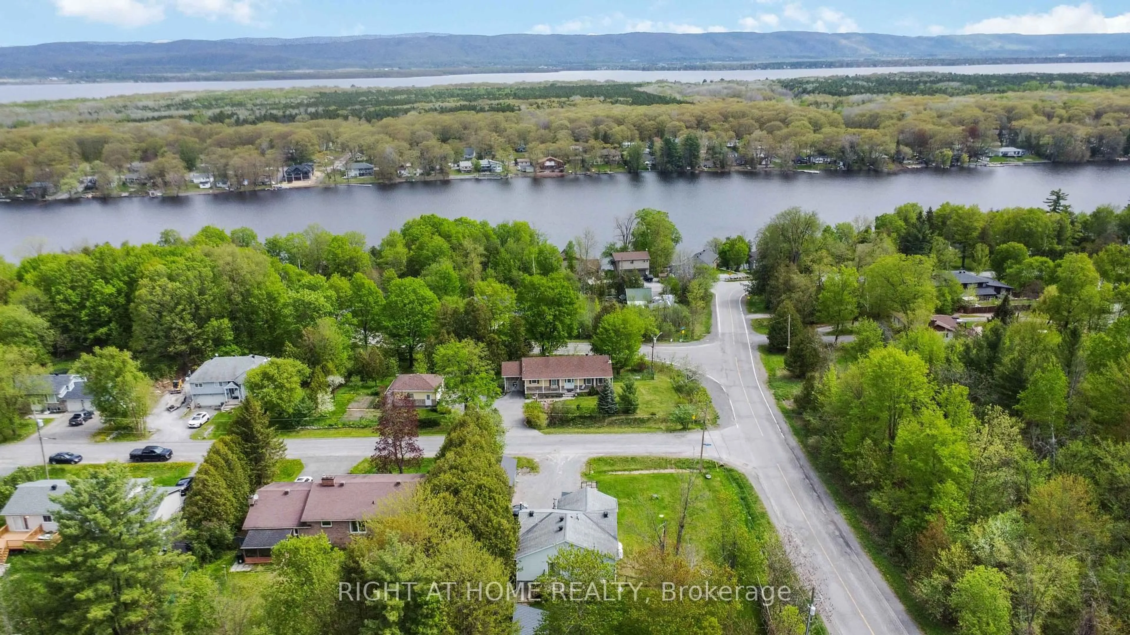 A pic from outside/outdoor area/front of a property/back of a property/a pic from drone, water/lake/river/ocean view for 104 & 110 Highview Dr, Ottawa Ontario K0A 3M0