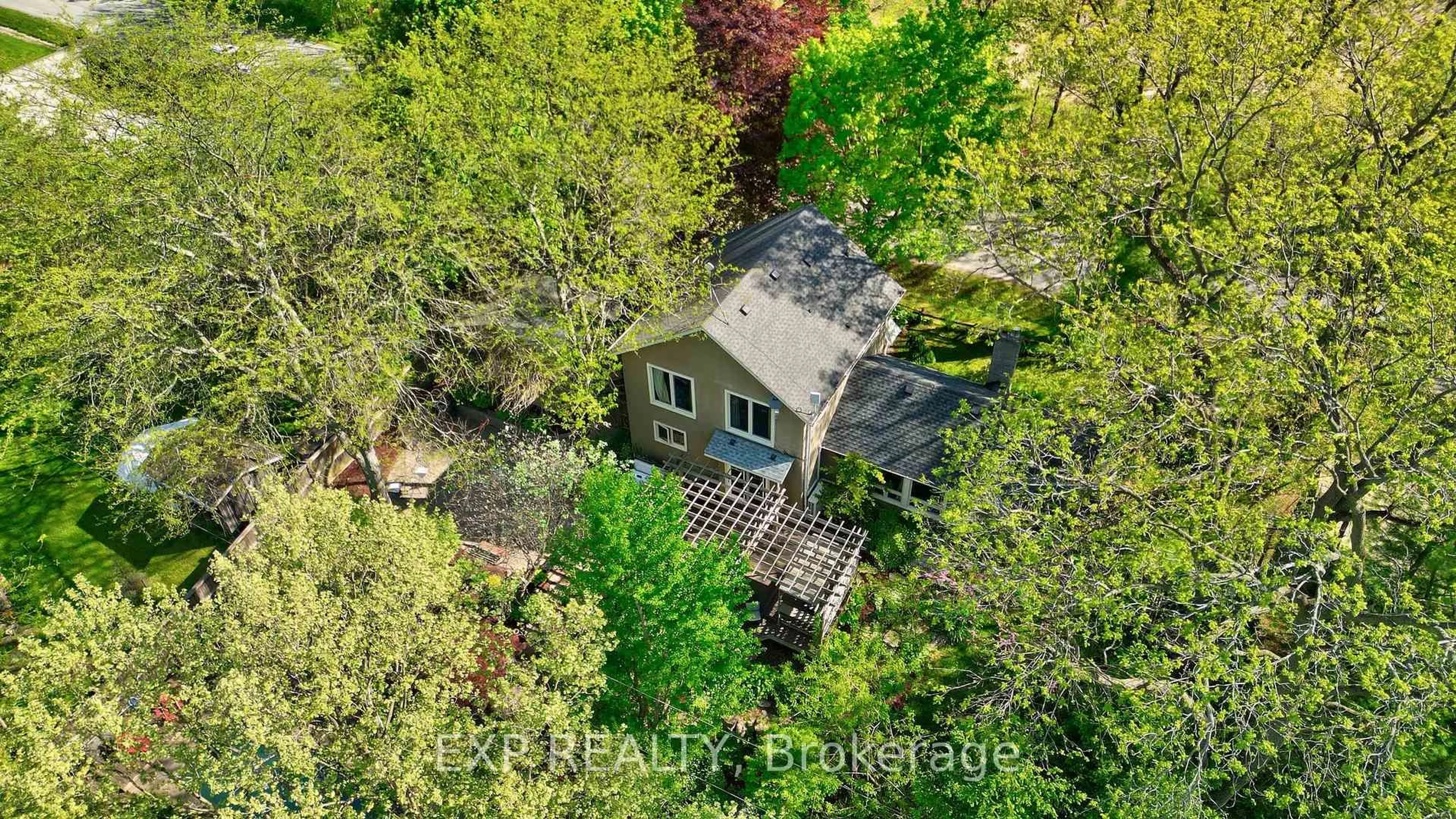A pic from outside/outdoor area/front of a property/back of a property/a pic from drone, forest/trees view for 38 Roland Rd, Pelham Ontario L0S 1M0