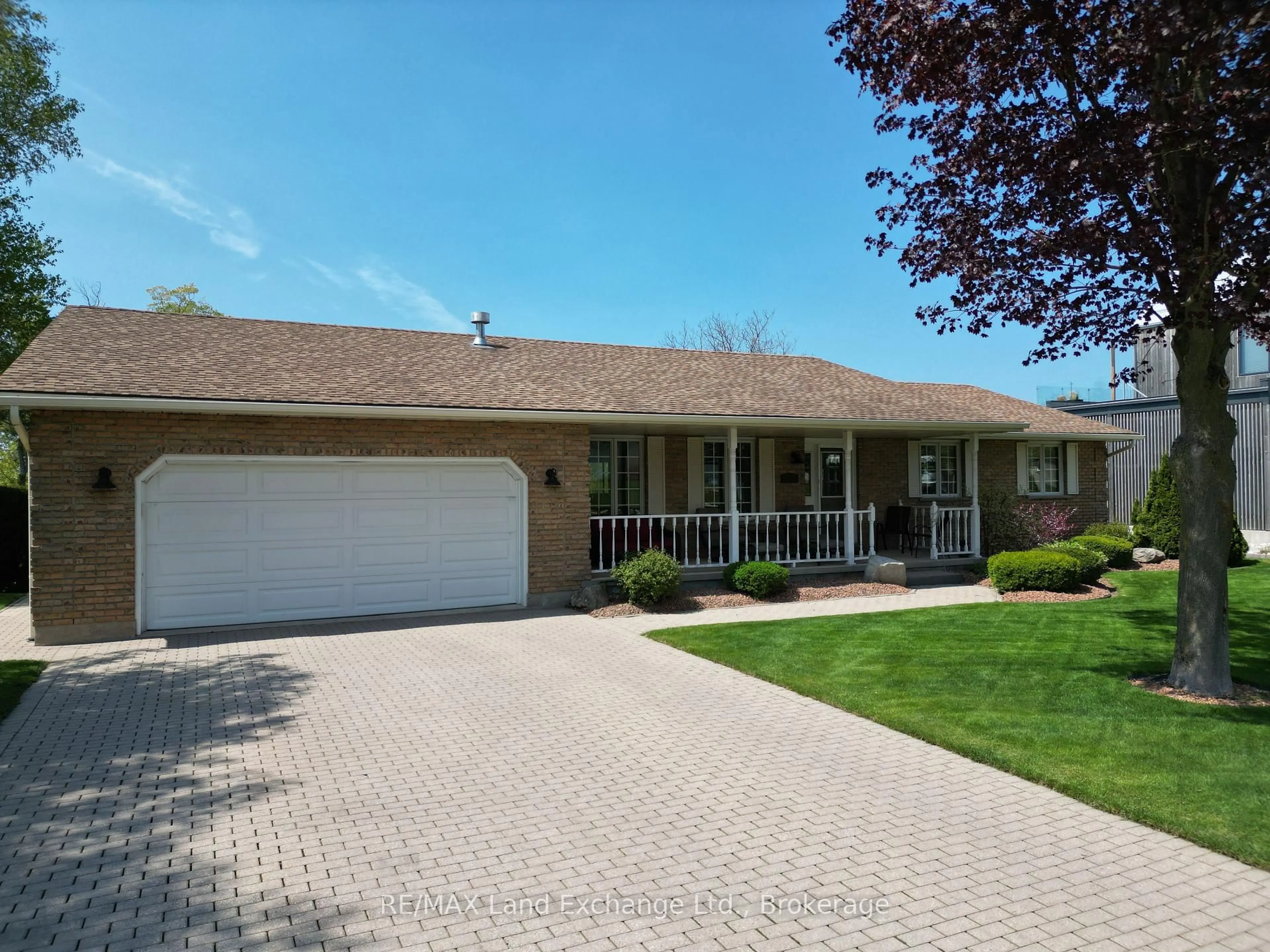 Home with vinyl exterior material, street for 276 Penetangore Row, Kincardine Ontario N2Z 2P5