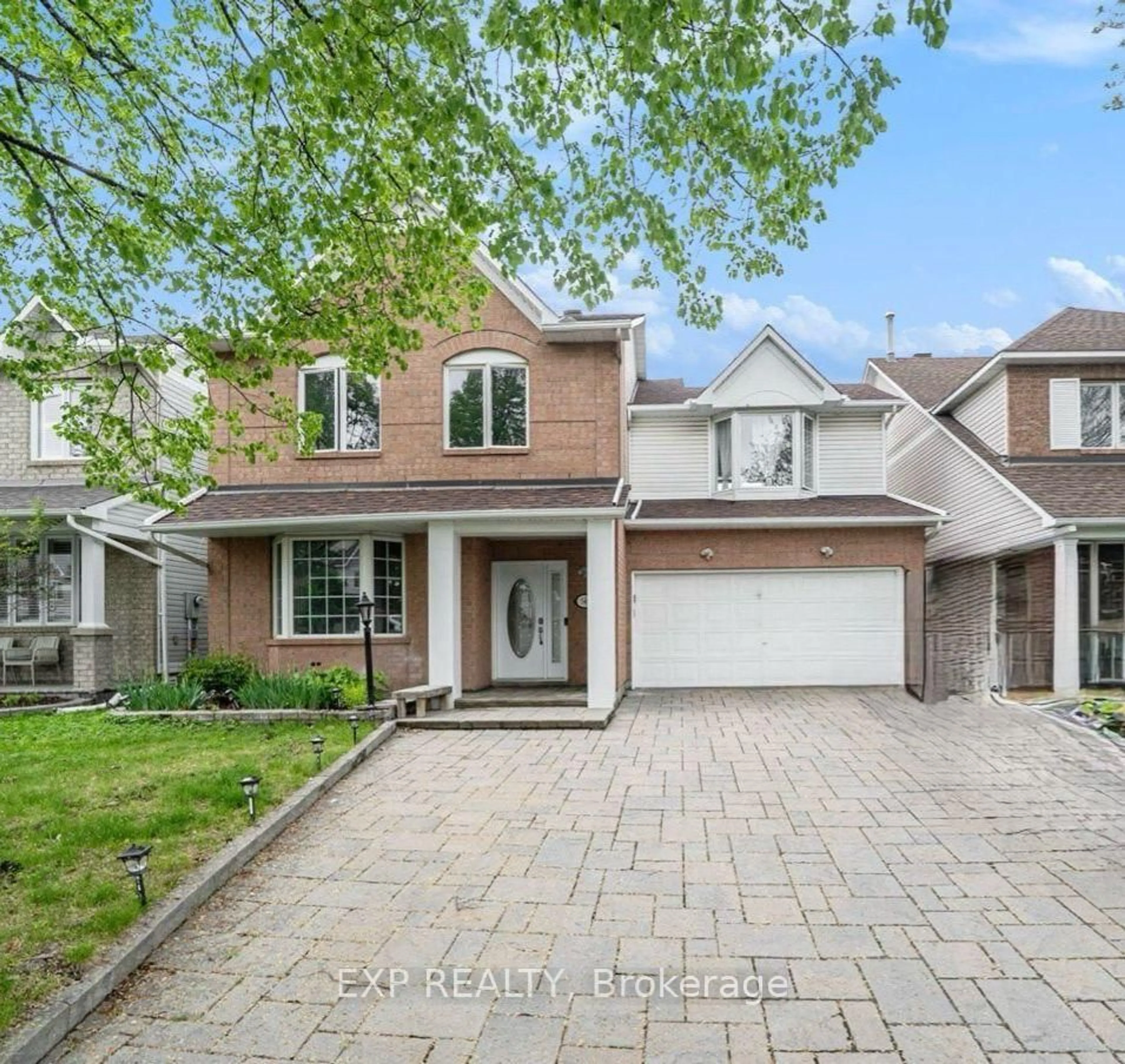 Home with brick exterior material, street for 340 Stoneway Dr, Ottawa Ontario K2G 6B8
